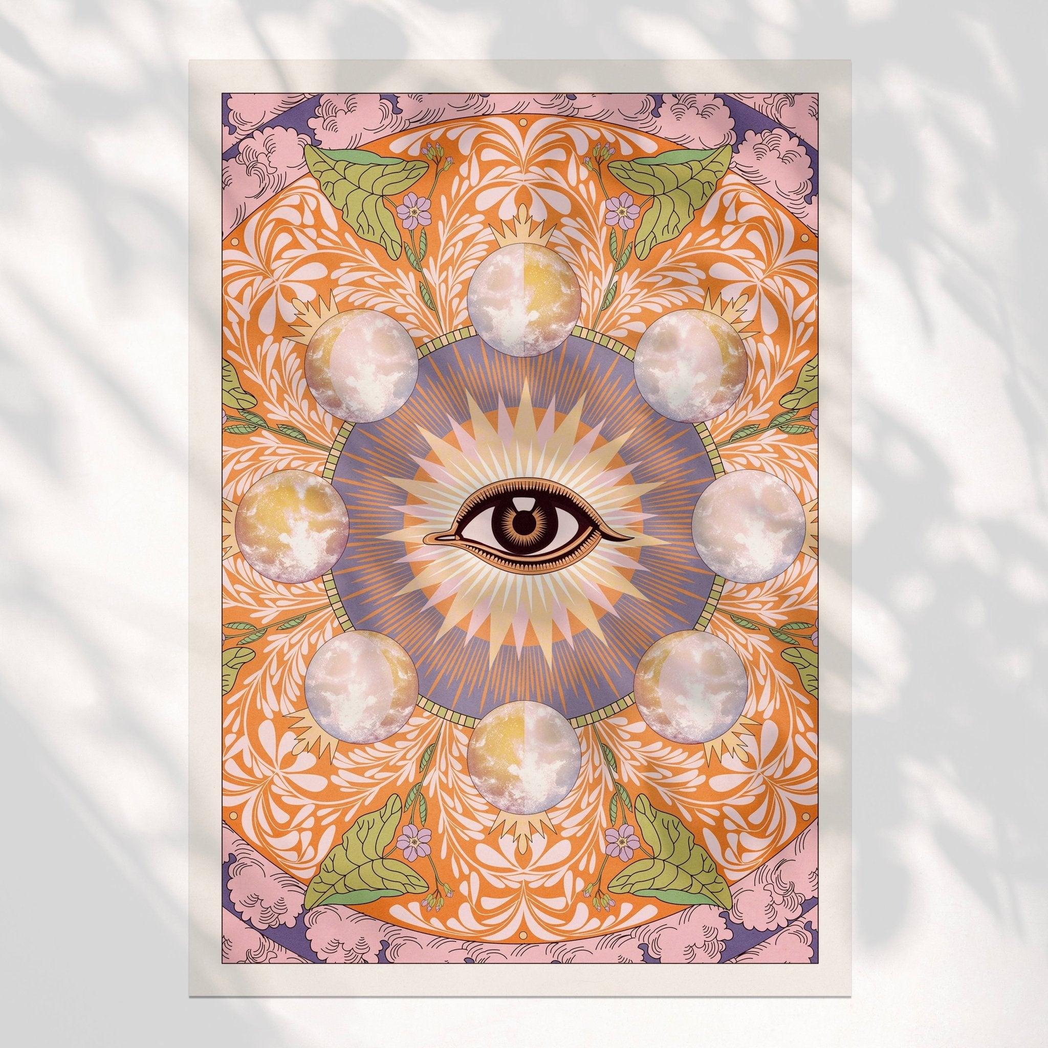 Starry Eyed Art Print featuring an all-seeing eye design surrounded by moons and floral patterns, printed on high-quality paper.