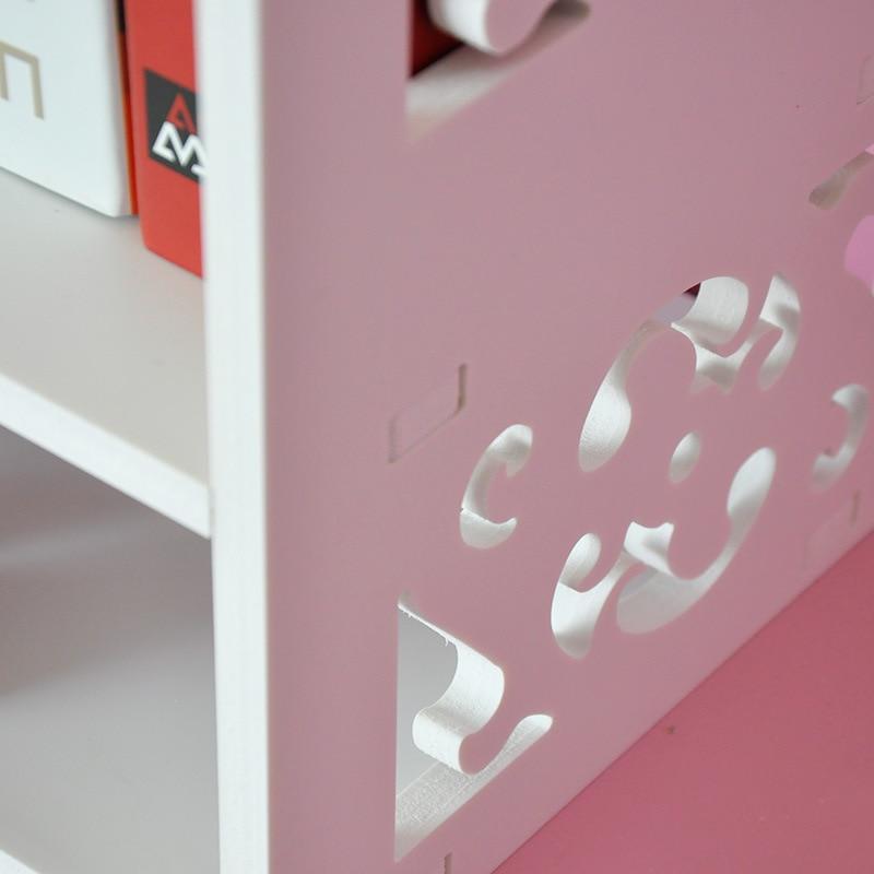 Large white bookshelf made of wood-plastic board with three rows for books and decor, featuring a minimalist modern design.