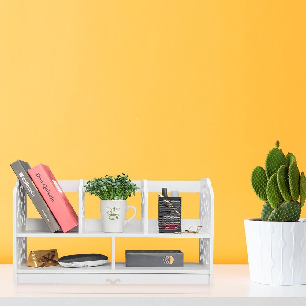 Large white bookshelf made of wood-plastic board with three rows for books and decor, featuring a minimalist modern design.