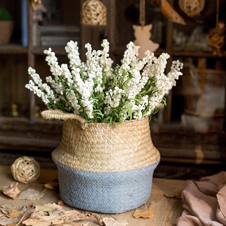 A stylish Straw Basket Pop Up Belly Basket in natural straw with colorful options, showcasing its unique pop-up design and various sizes.