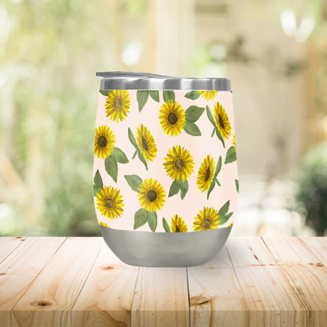 A vibrant sunflower watercolor wine tumbler with a double-wall design, perfect for outdoor use and keeping beverages cool.