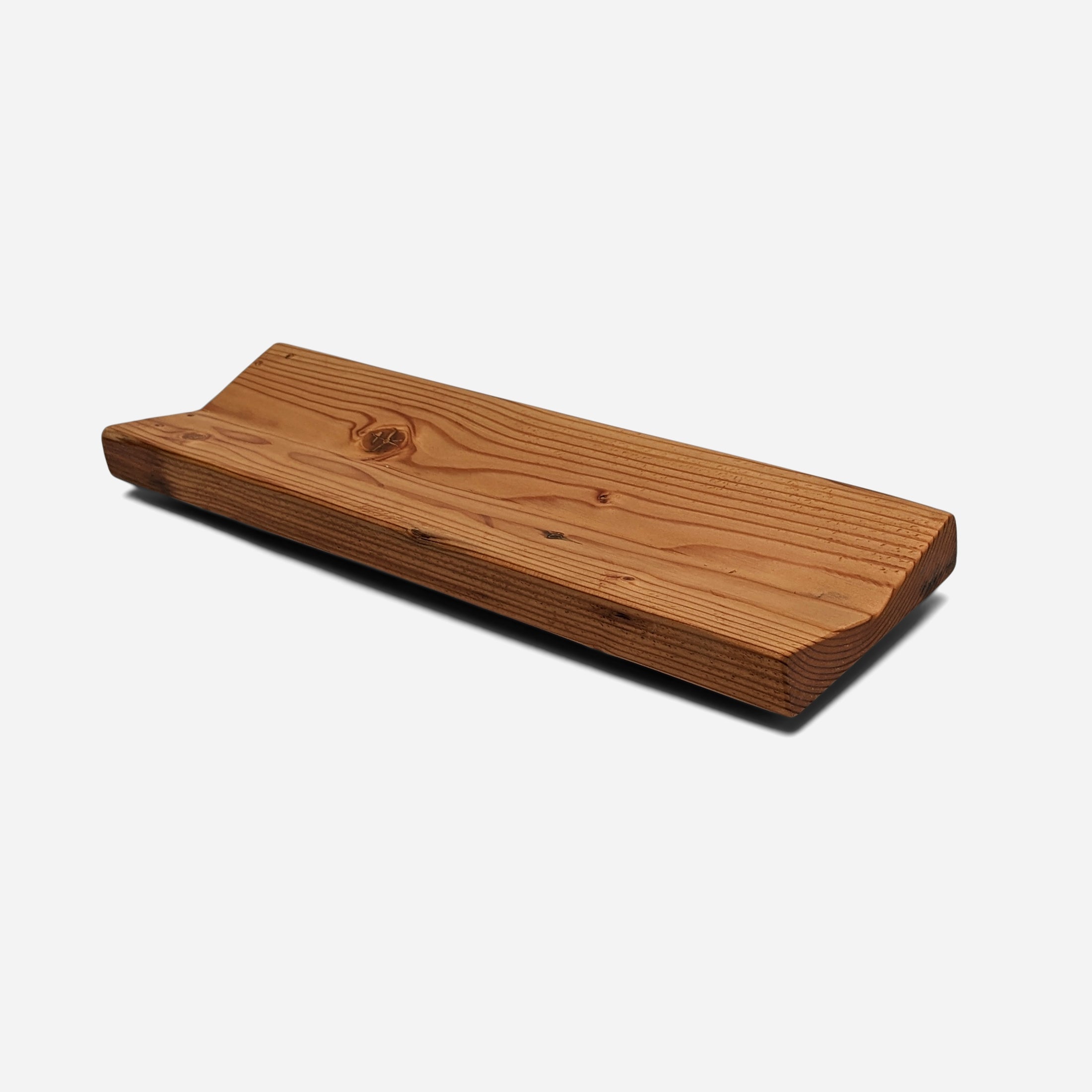 A unique wooden serving tray made from Doug Fir wood, featuring a beeswax finish, perfect for serving snacks during the Super Bowl.