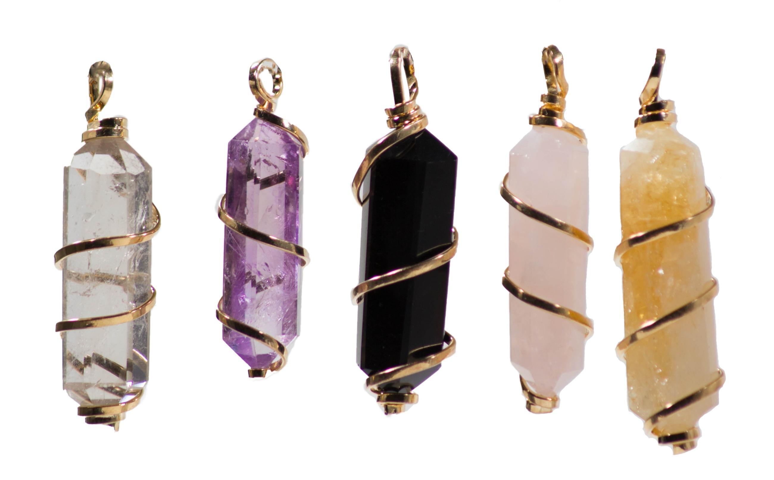 Swirl Double Terminated Pendants featuring various gemstones wrapped in gold or silver wire, showcasing their elegant design.