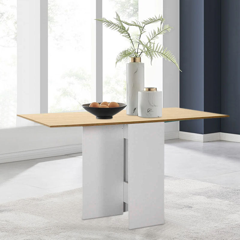 Extendable dining table SARA in white and oak finish, showcasing its compact design and elegant style.