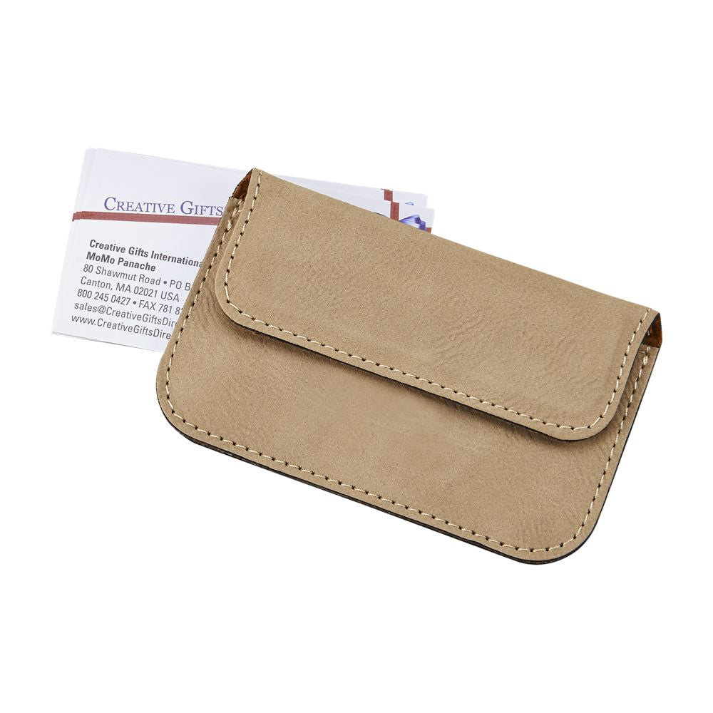 Stylish tan leatherette card case with magnetized flap, holding business cards.