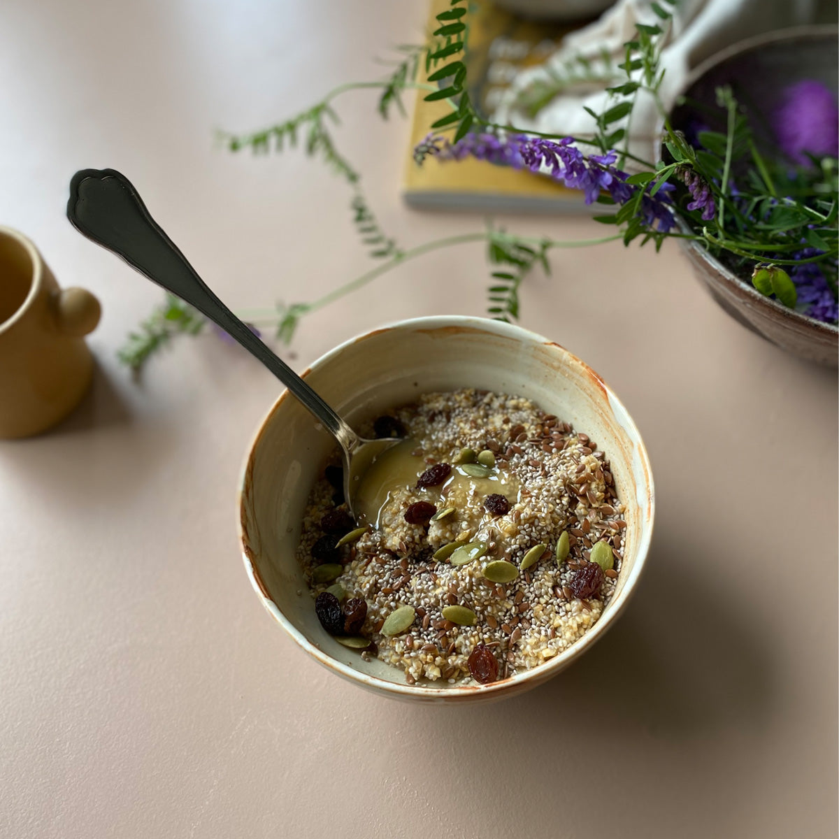 A medium-sized TANG ceramic bowl, handmade in Lofoten, featuring a unique glaze from local seaweeds, showcasing its imperfectly perfect design.