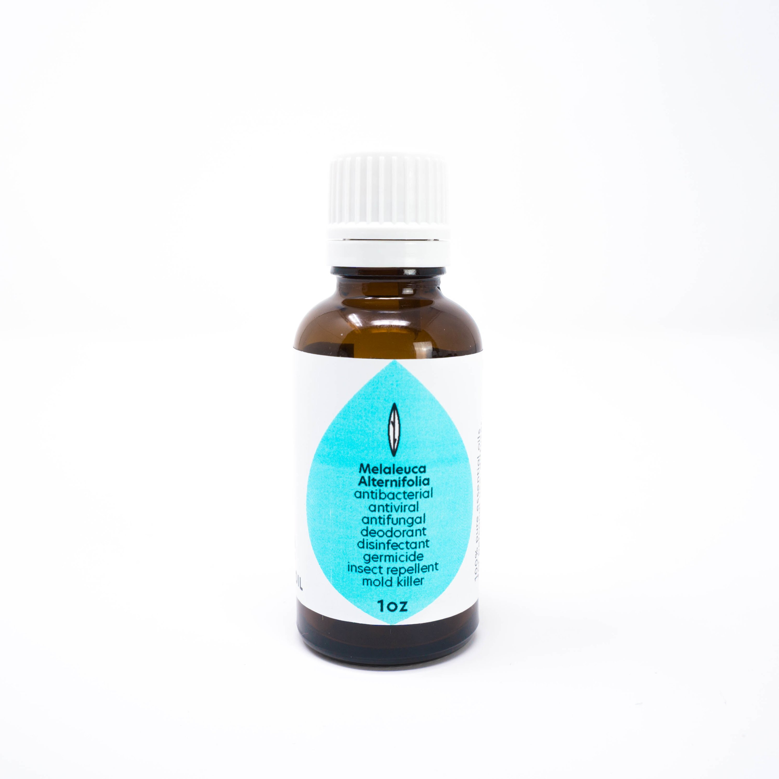 A 1oz bottle of 100% Pure Tea Tree Essential Oil with a green label, showcasing its therapeutic-grade quality and natural properties.