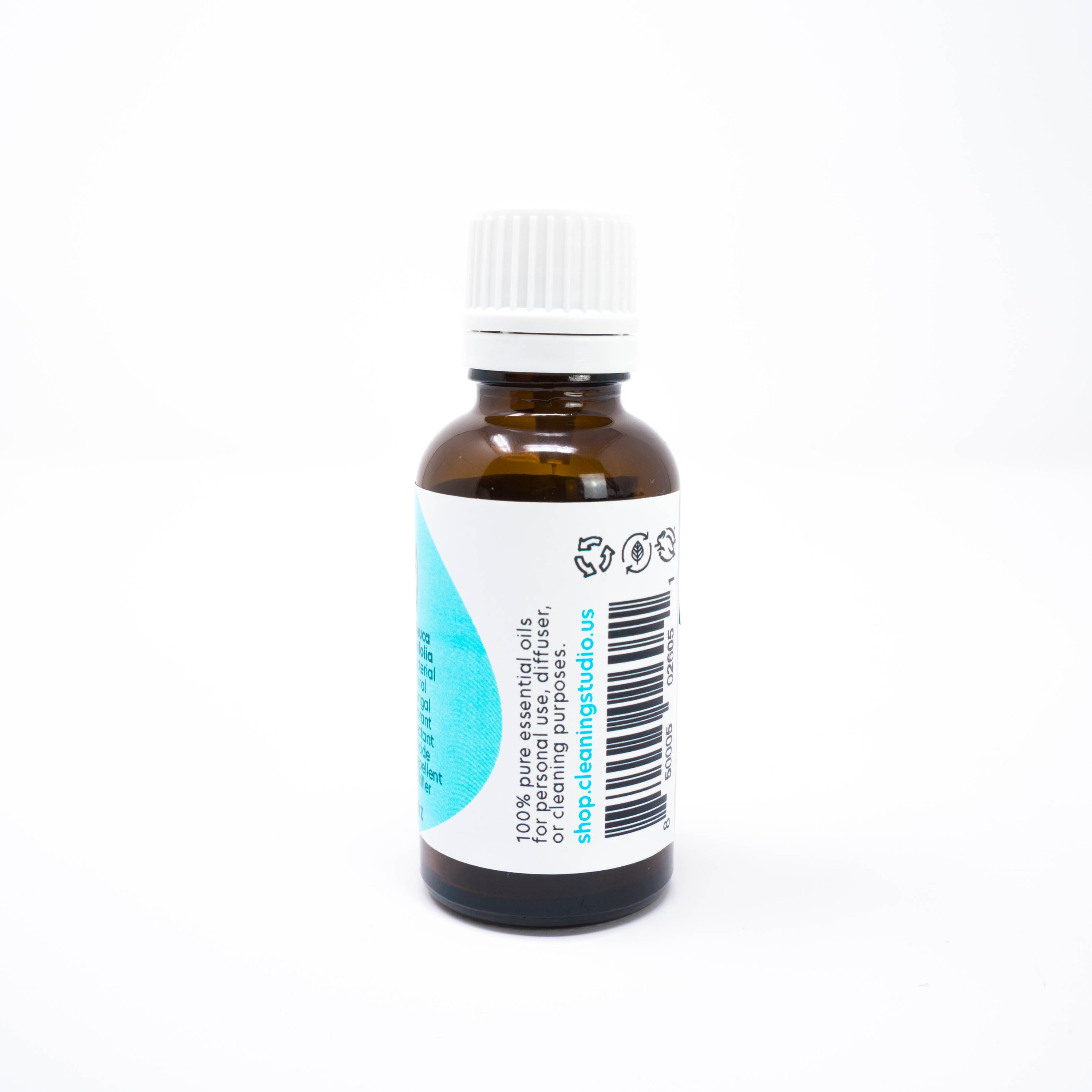 A 1oz bottle of 100% Pure Tea Tree Essential Oil with a green label, showcasing its therapeutic-grade quality and natural properties.