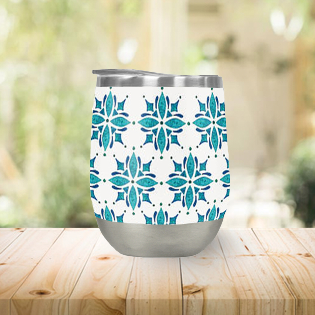 Teal Tile Wine Tumbler with double-wall insulation and plastic lid, perfect for outdoor use.