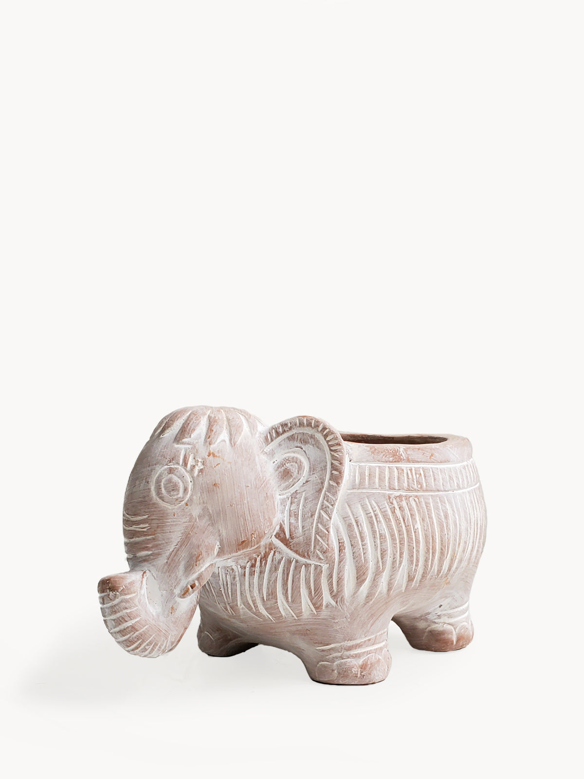 A charming terracotta elephant-shaped pot, perfect for colorful flowers and plants, showcasing its unique design and natural clay finish.