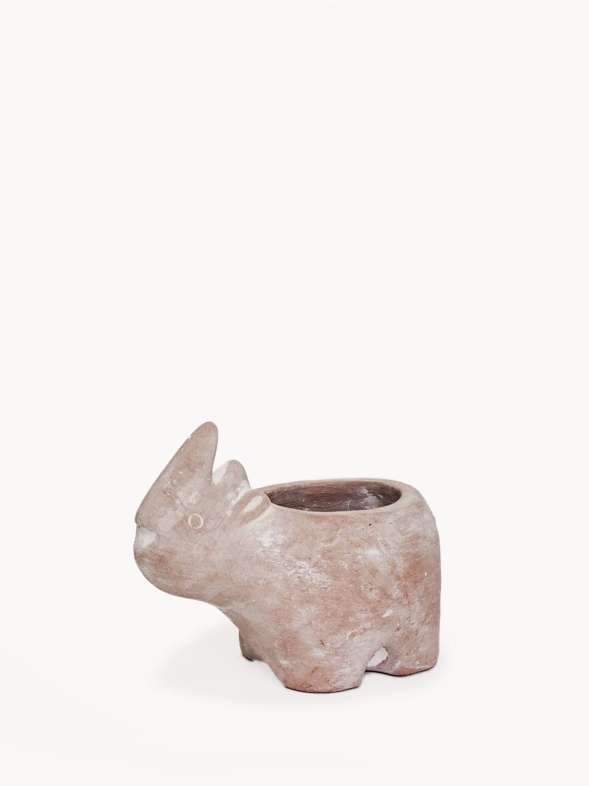 A whimsical terracotta pot shaped like a rhino, showcasing its natural clay finish and playful design, perfect for plants or as a decorative piece.