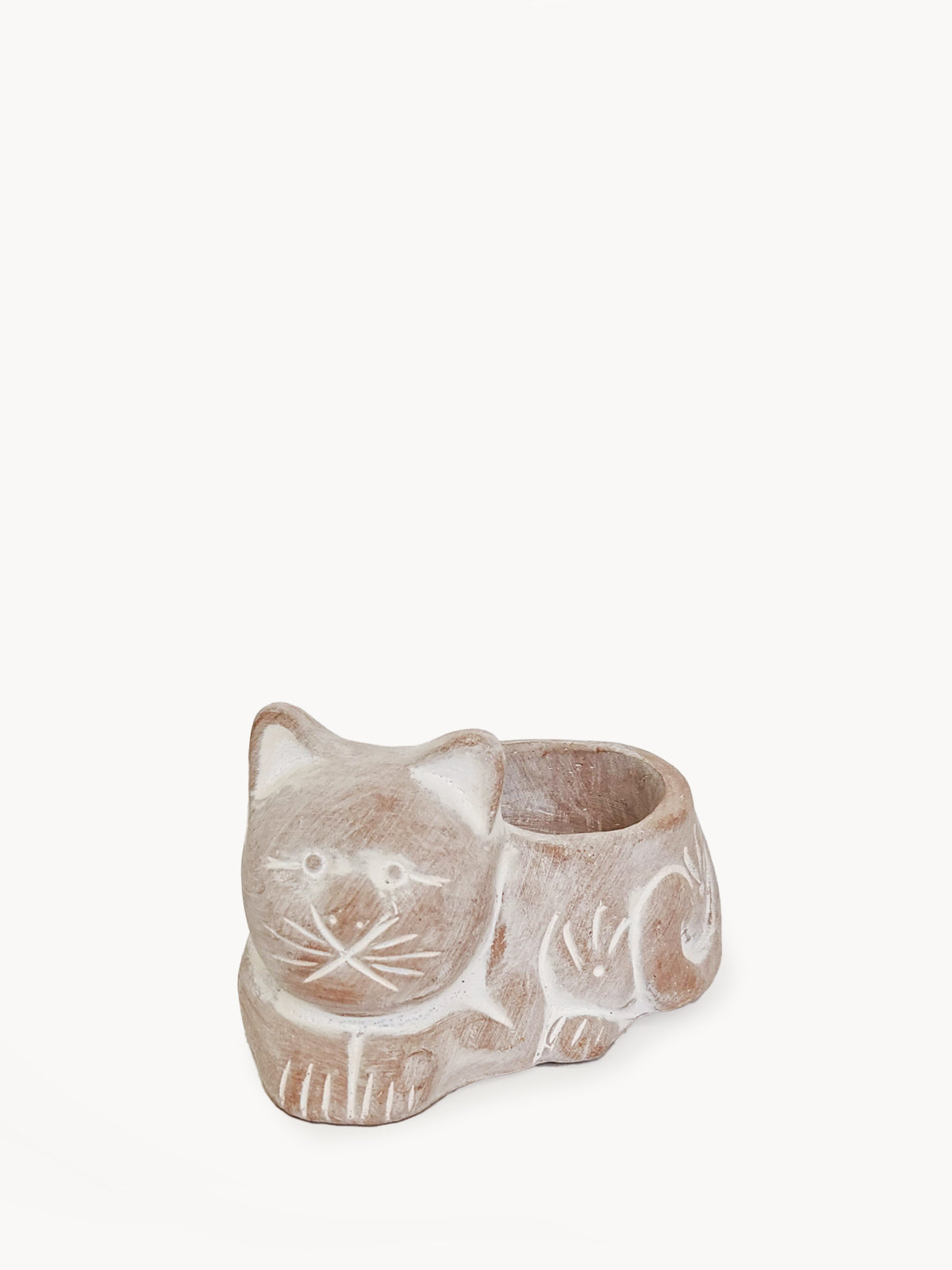 Handmade terracotta tea light candle holder shaped like a cat, showcasing natural color and unique design.