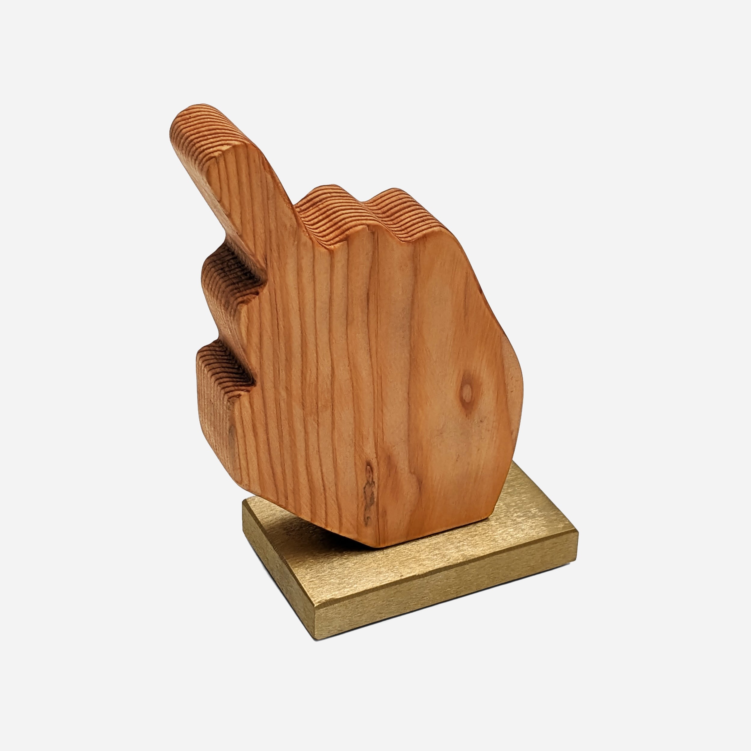 A unique decorative piece called The Finger, made from Doug Fir wood and brass, showcasing its artistic design and craftsmanship.