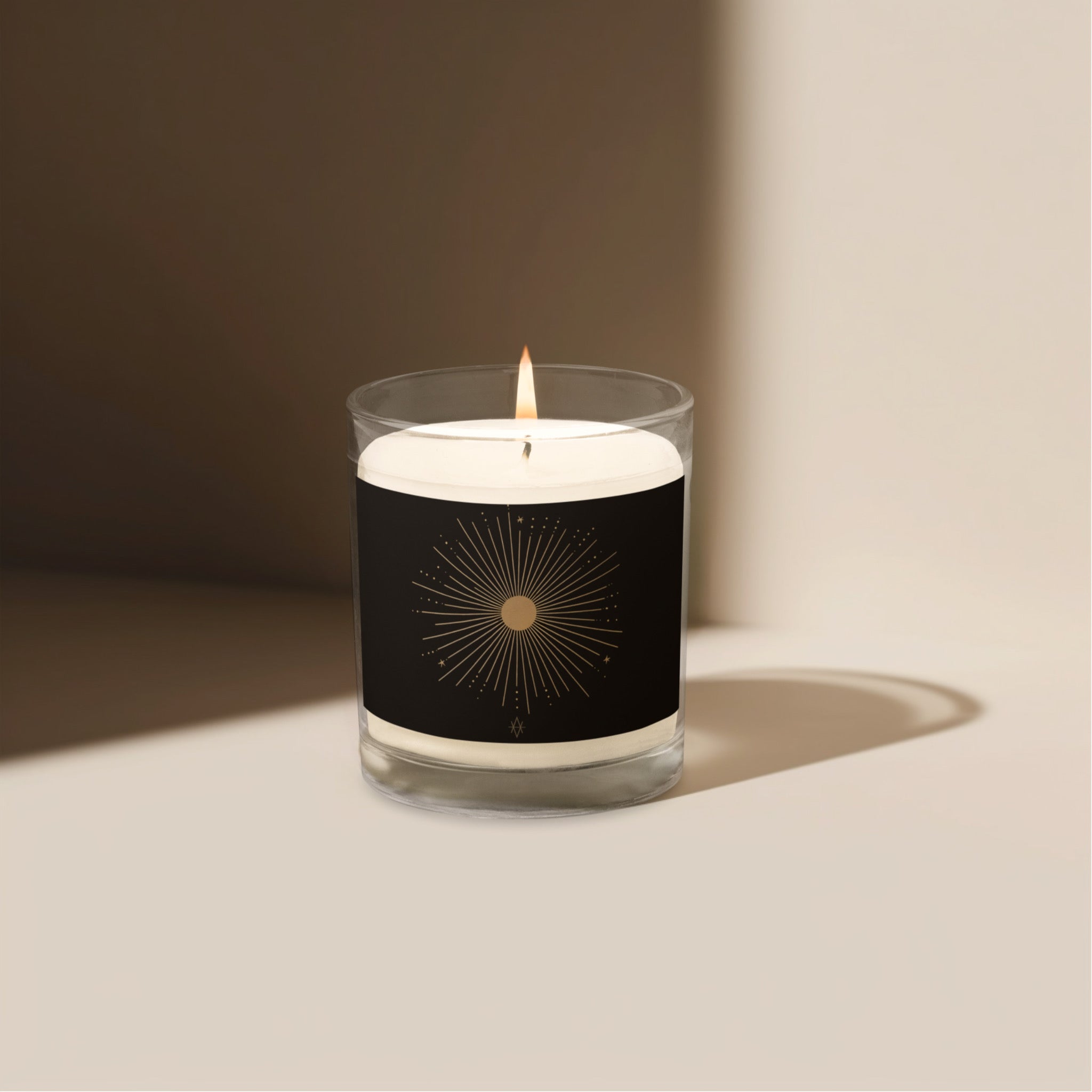 A beautifully crafted glass jar soy wax candle named 'The Sun', designed to provide warmth and comfort during winter.