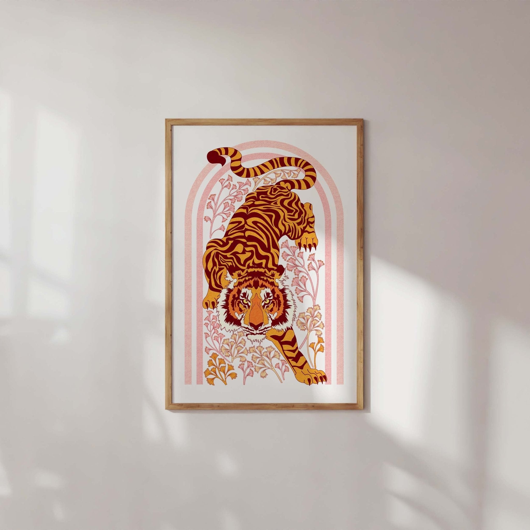 Tiger Tiger Art Print featuring a tiger illustration with botanical motifs in an orange arch shape.