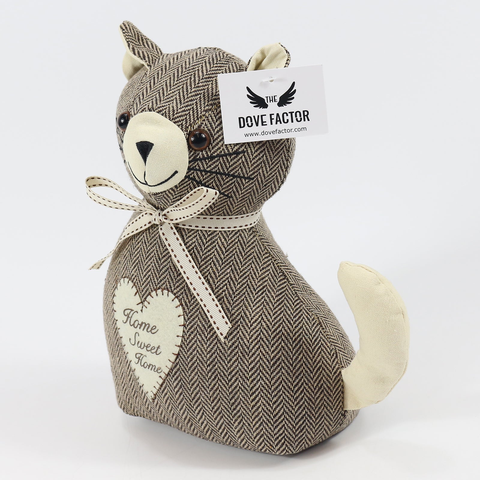 Tilly The Cat Soft Weighted Fabric Door Stop, a charming cat-shaped door stop made of soft polyester, designed to hold doors open securely.