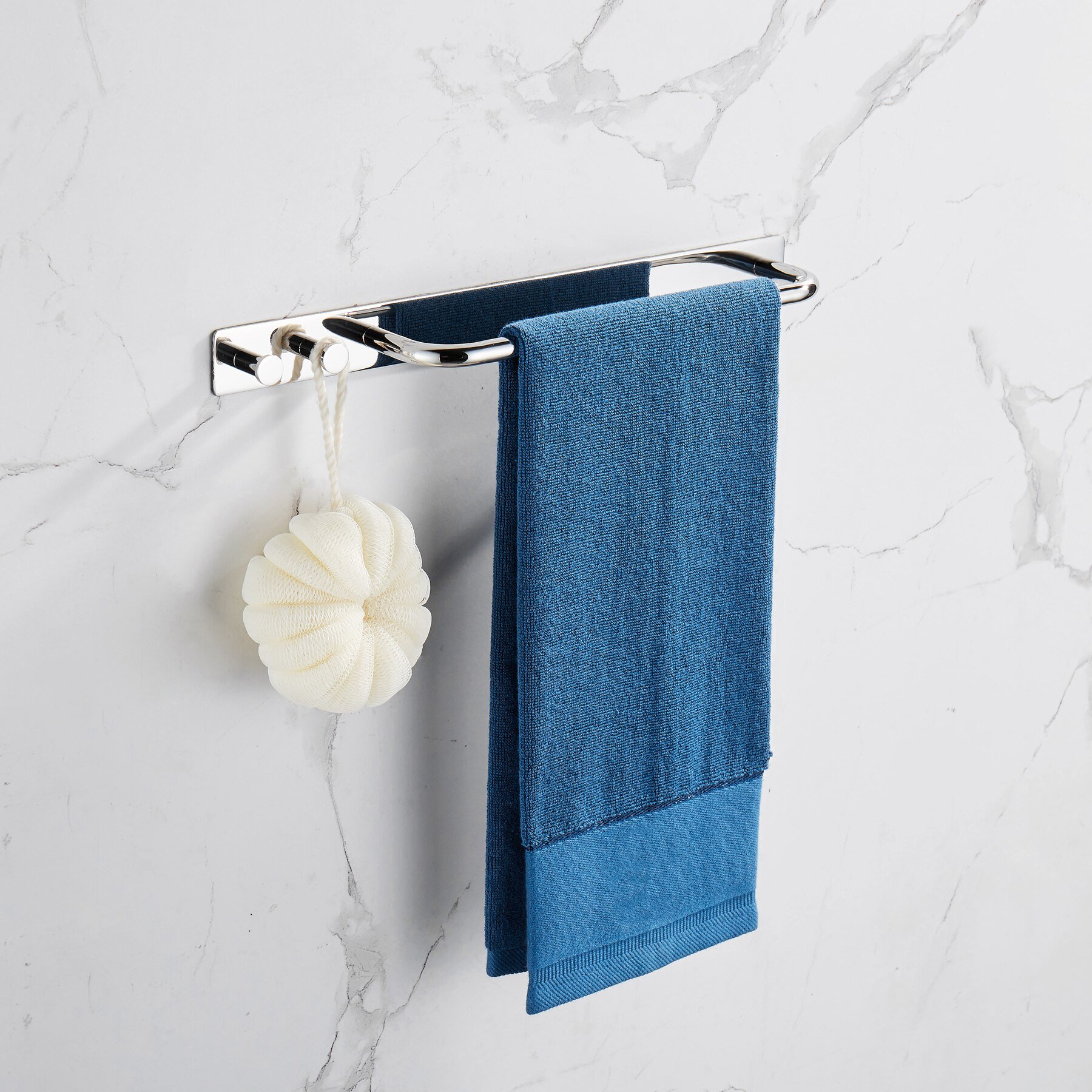 A sleek towel bar holder rack made of polished 304 stainless steel, featuring a strong adhesive backing for easy installation, ideal for hanging towels and robes.