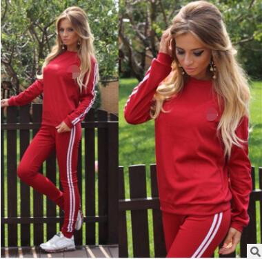 A stylish two-piece tracksuit for women featuring a geometric print, made from soft polyester, perfect for winter activities.