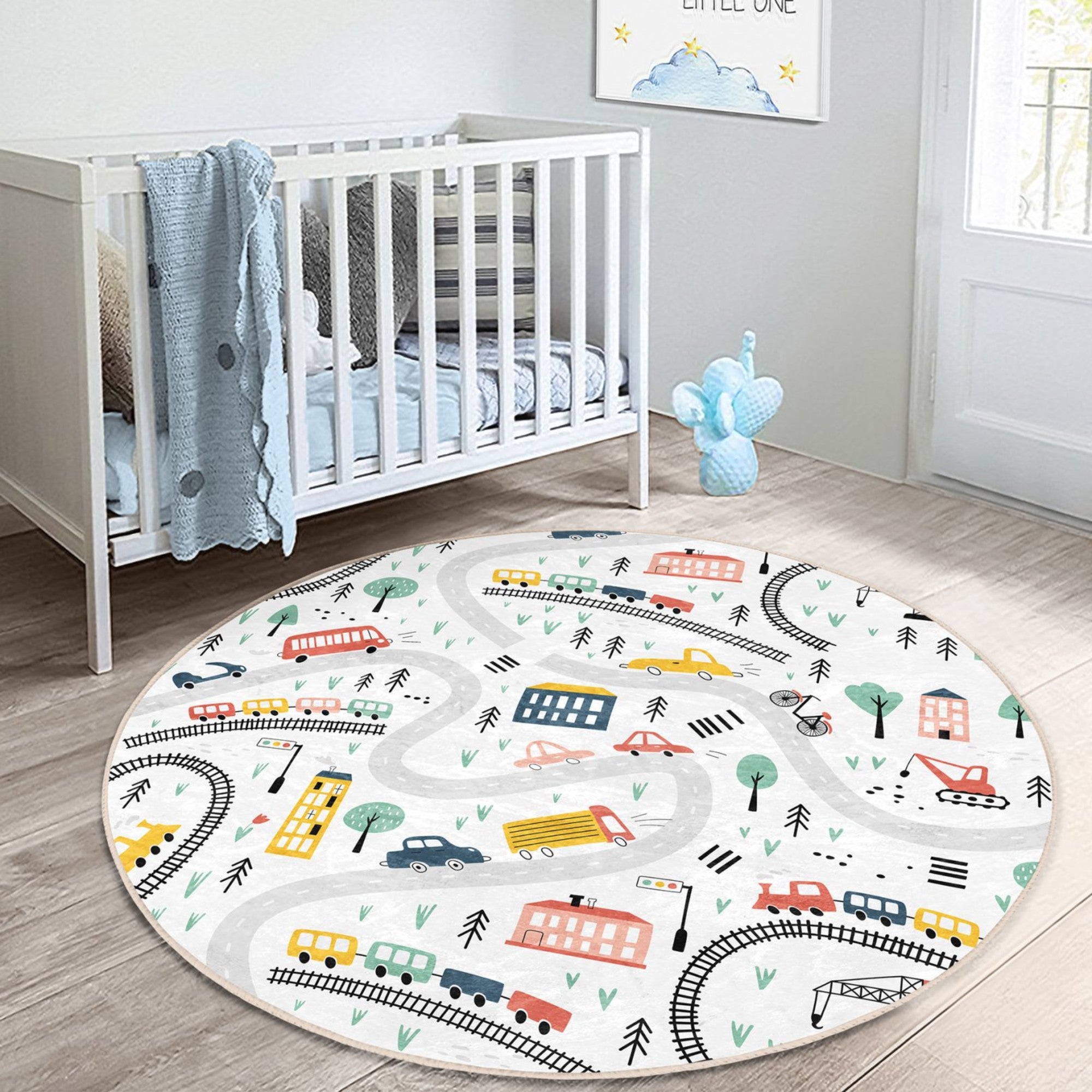 A colorful round rug featuring playful trains and cars, perfect for a child's room, showcasing vibrant designs and soft texture.