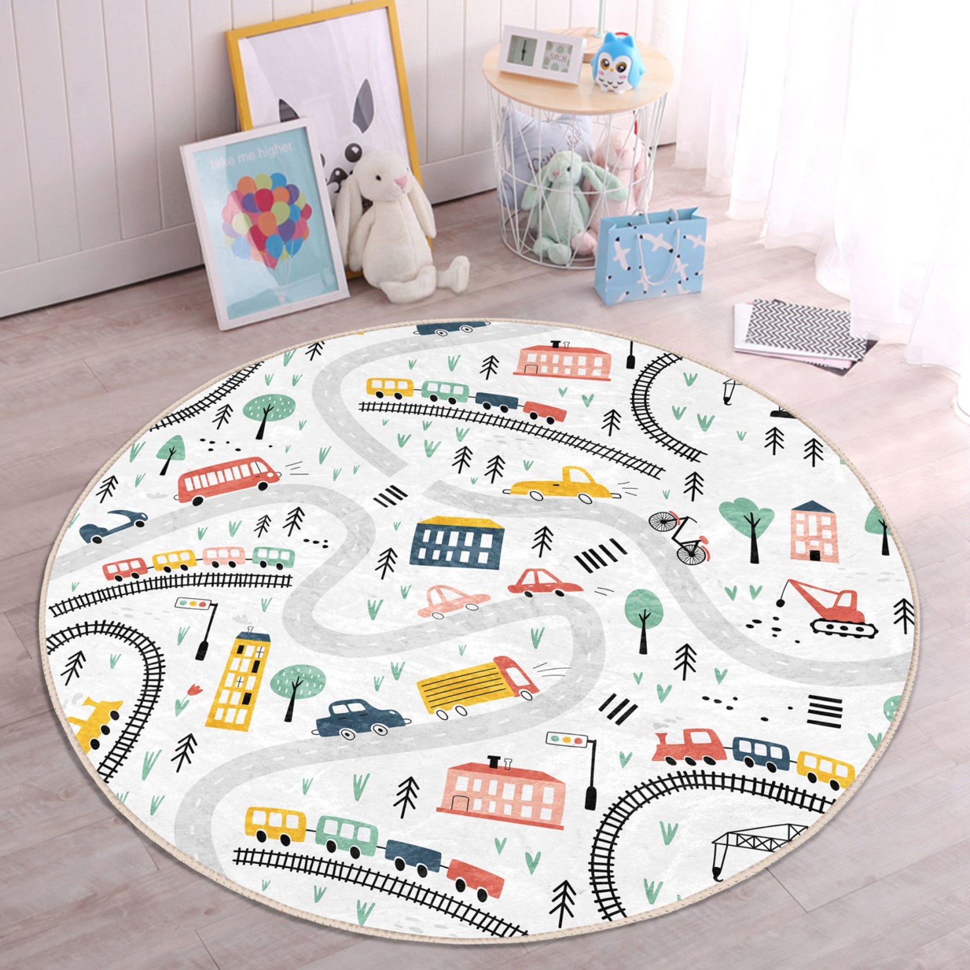 A colorful round rug featuring playful trains and cars, perfect for a child's room, showcasing vibrant designs and soft texture.