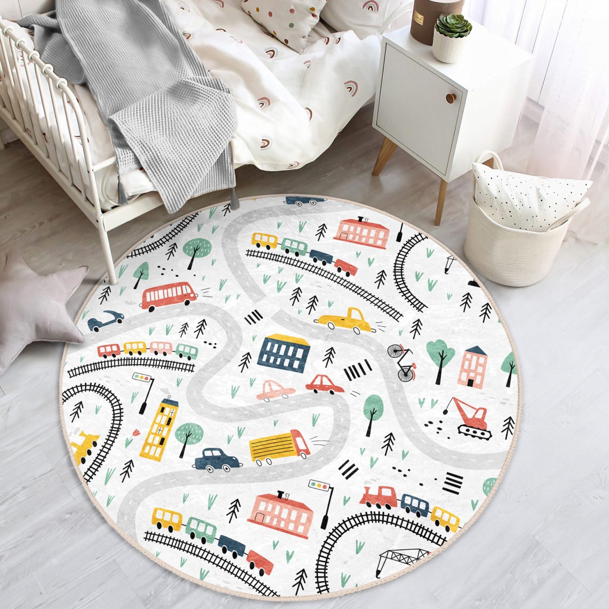 A colorful round rug featuring playful trains and cars, perfect for a child's room, showcasing vibrant designs and soft texture.