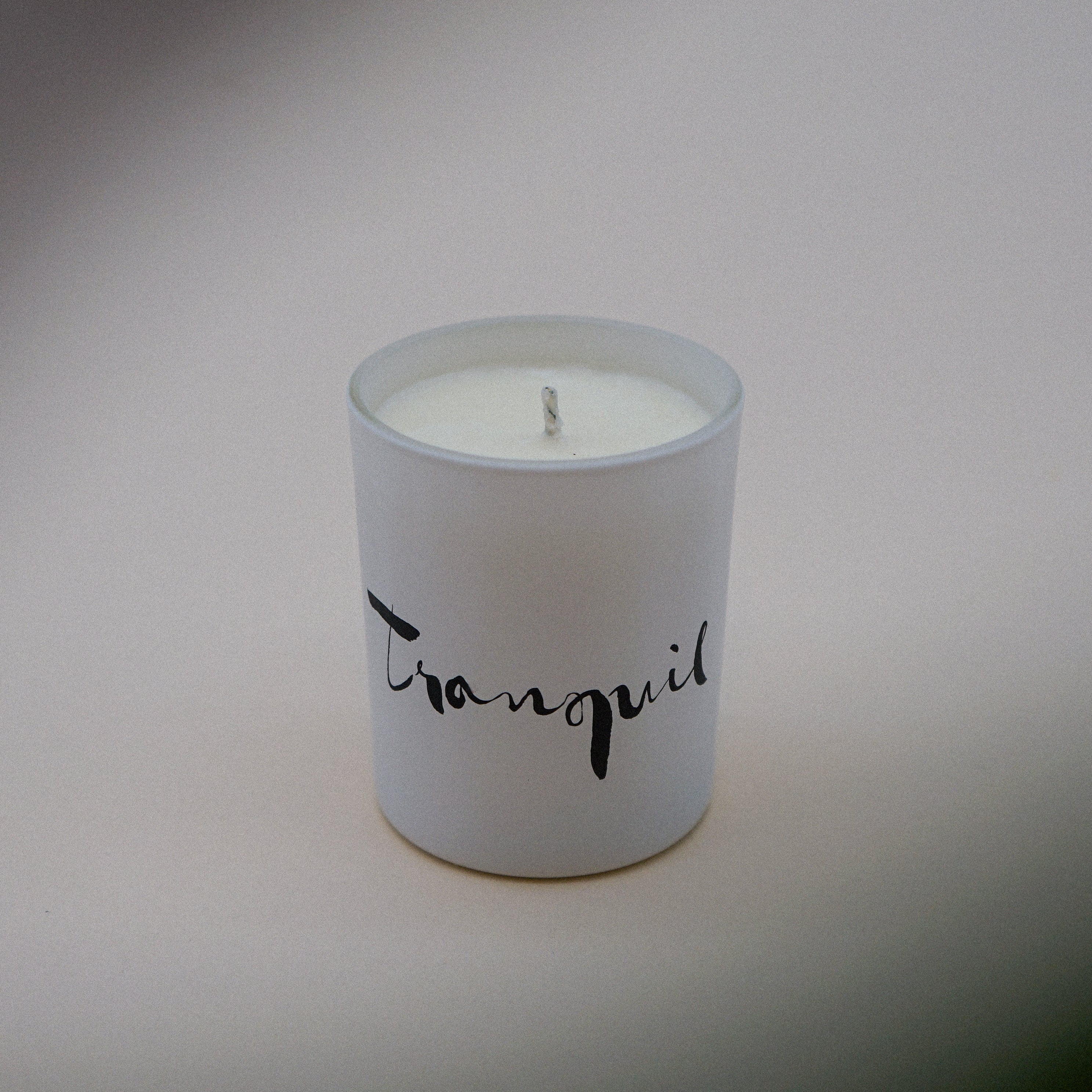 Tranquil Natural Wax Candle Set featuring lavender and bergamot scents in elegant white glass containers with a tranquil brush painting design.