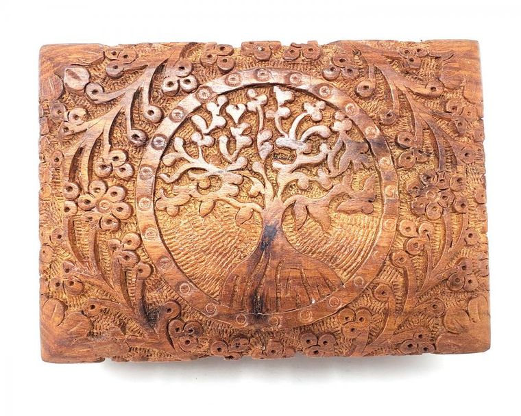 Hand carved wooden box featuring the Tree of Life design, measuring 5x7 inches, ideal for storing keepsakes.