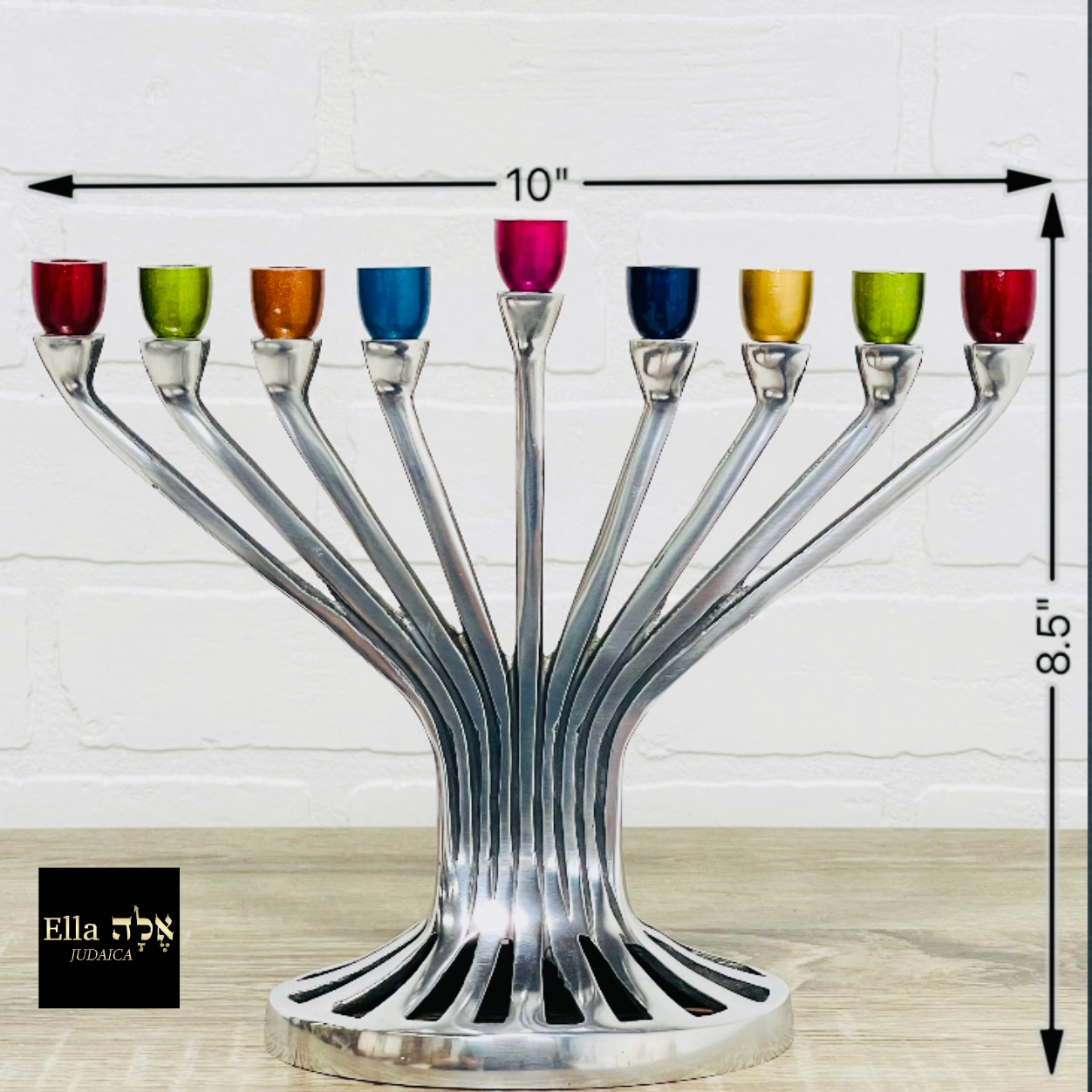 A beautifully designed Tree of Life Menorah made of aluminum with a polished nickel finish, showcasing a sleek and elegant silhouette.