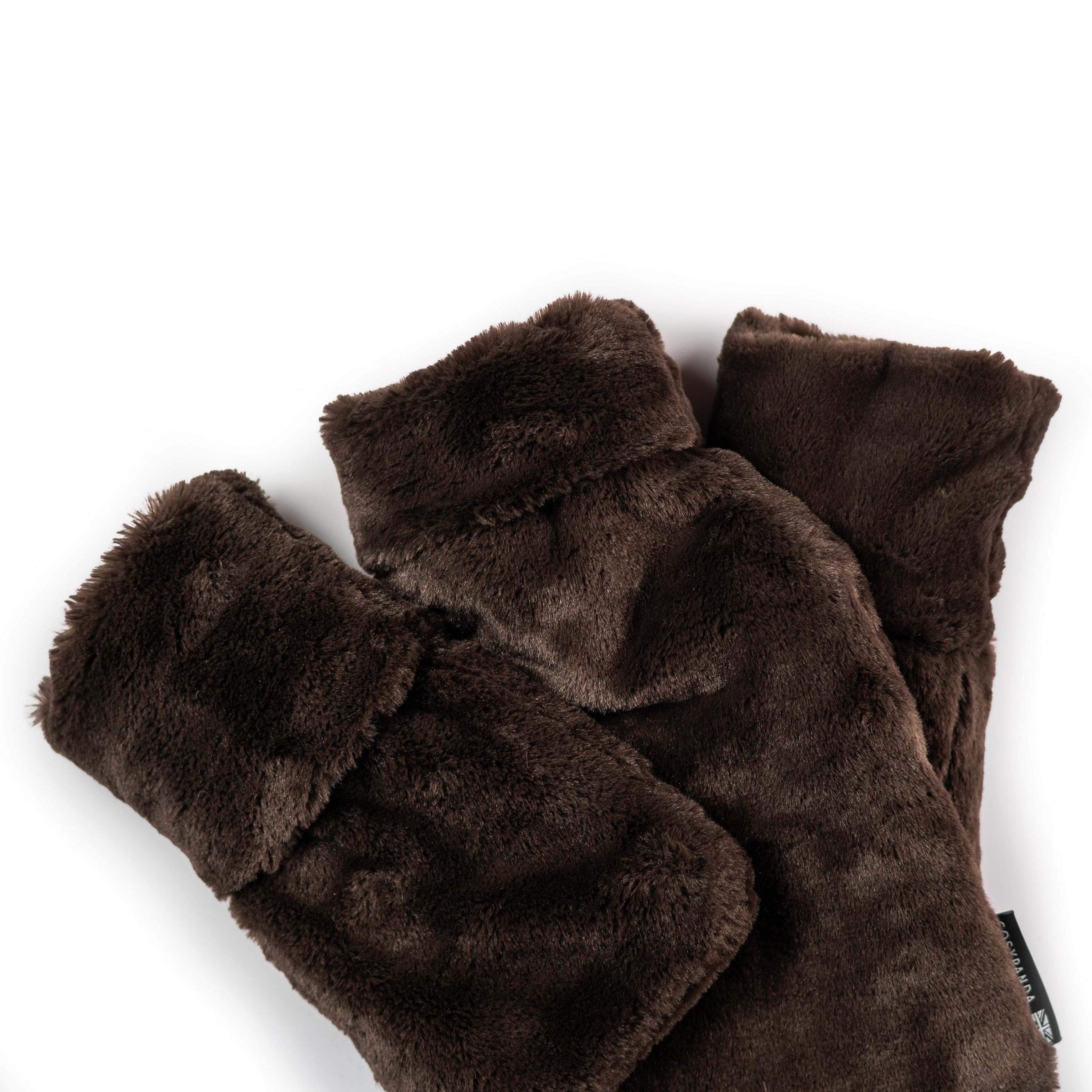 Triple Chocolate Faux Fur Hot Water Bottle Gift Set featuring three sizes of hot water bottles in dark chocolate faux fur.