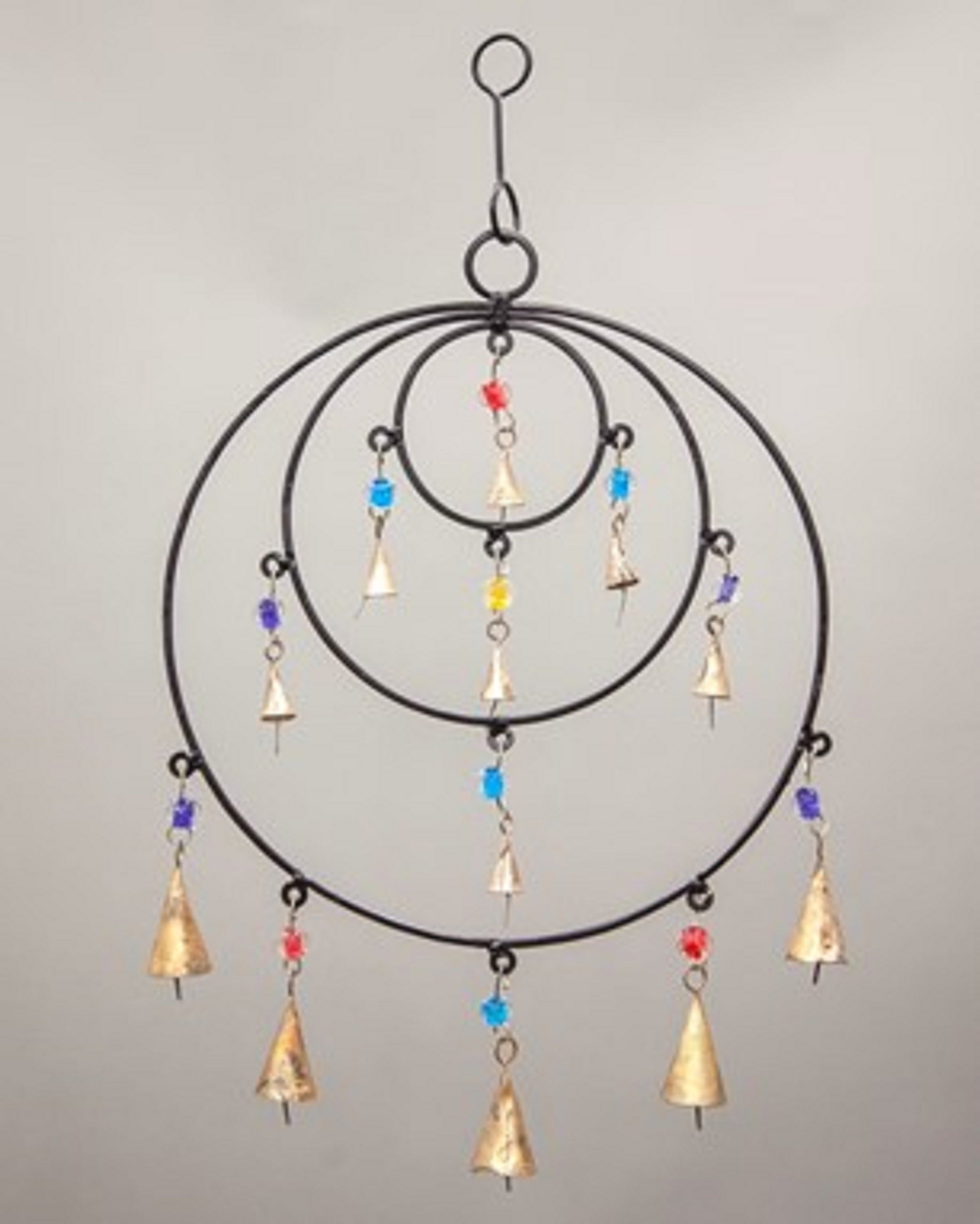 Triple Circle Chime featuring colorful glass beads and brass bells, handmade with sustainable materials, perfect for wall hanging decor.