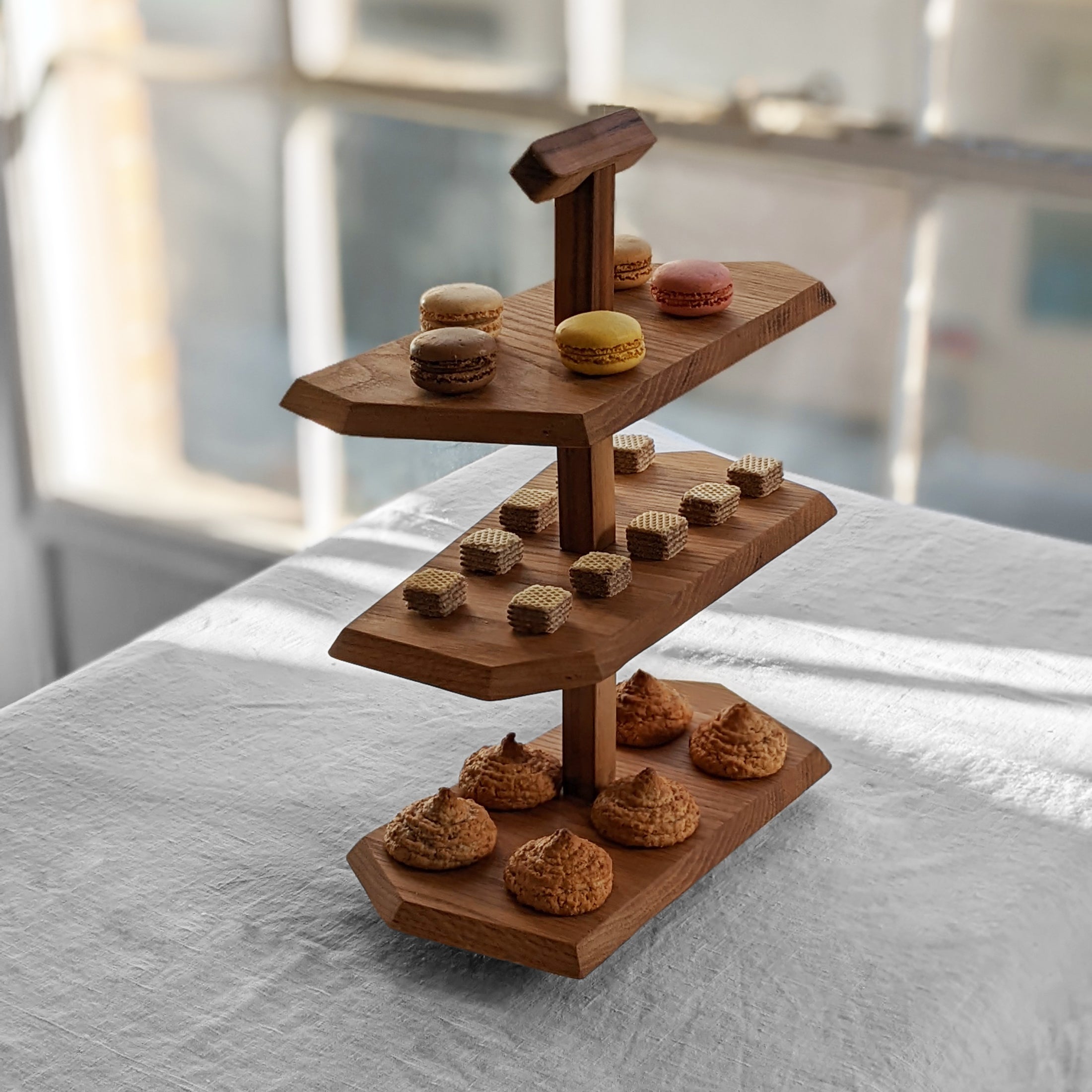 Triple Decker Stand made from Doug Fir wood with a beeswax finish, showcasing three unique levels for display.