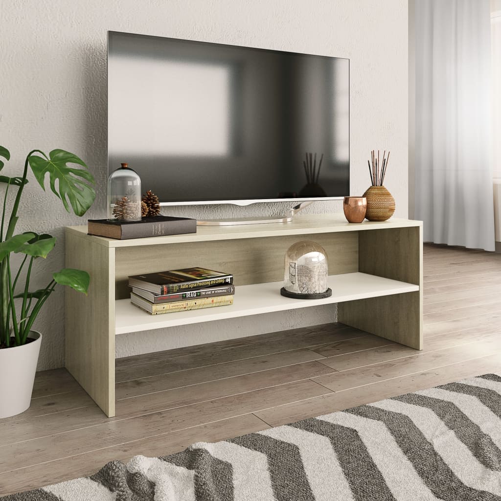 Modern TV stand with decor.