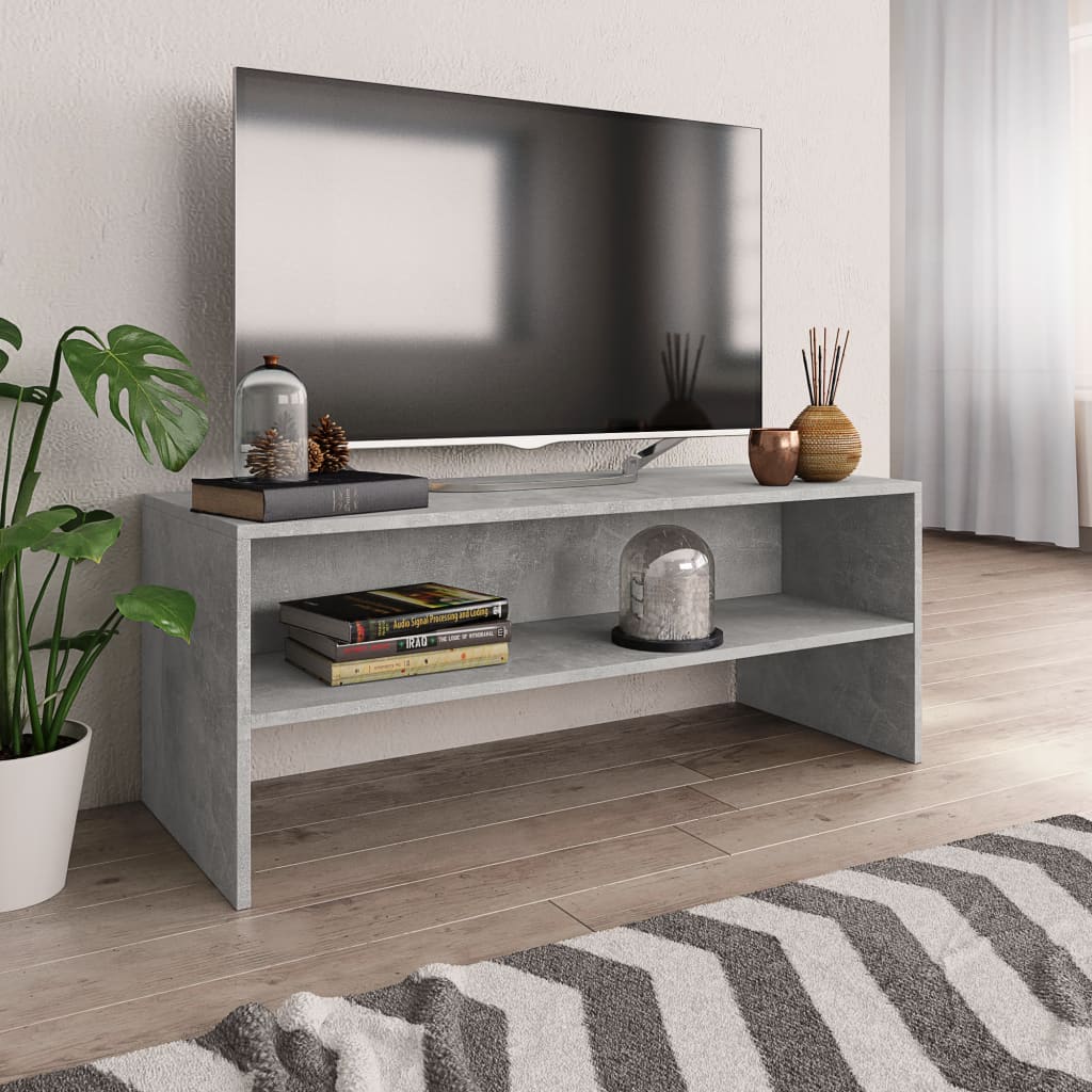 Modern TV stand with decorations.