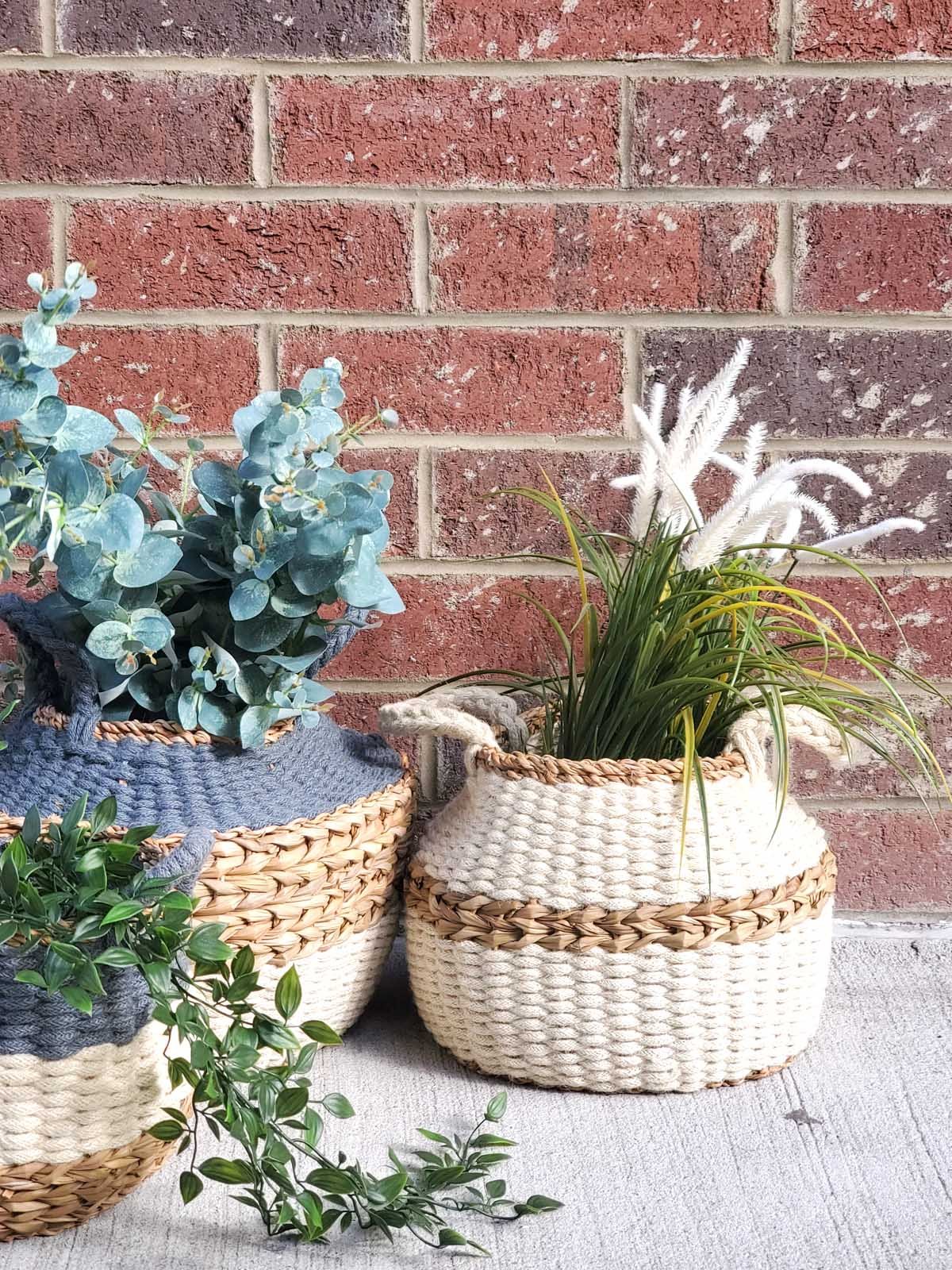 Ula Blanco Basket, handwoven from seagrass and jute, featuring a natural and white color scheme, perfect for stylish storage.