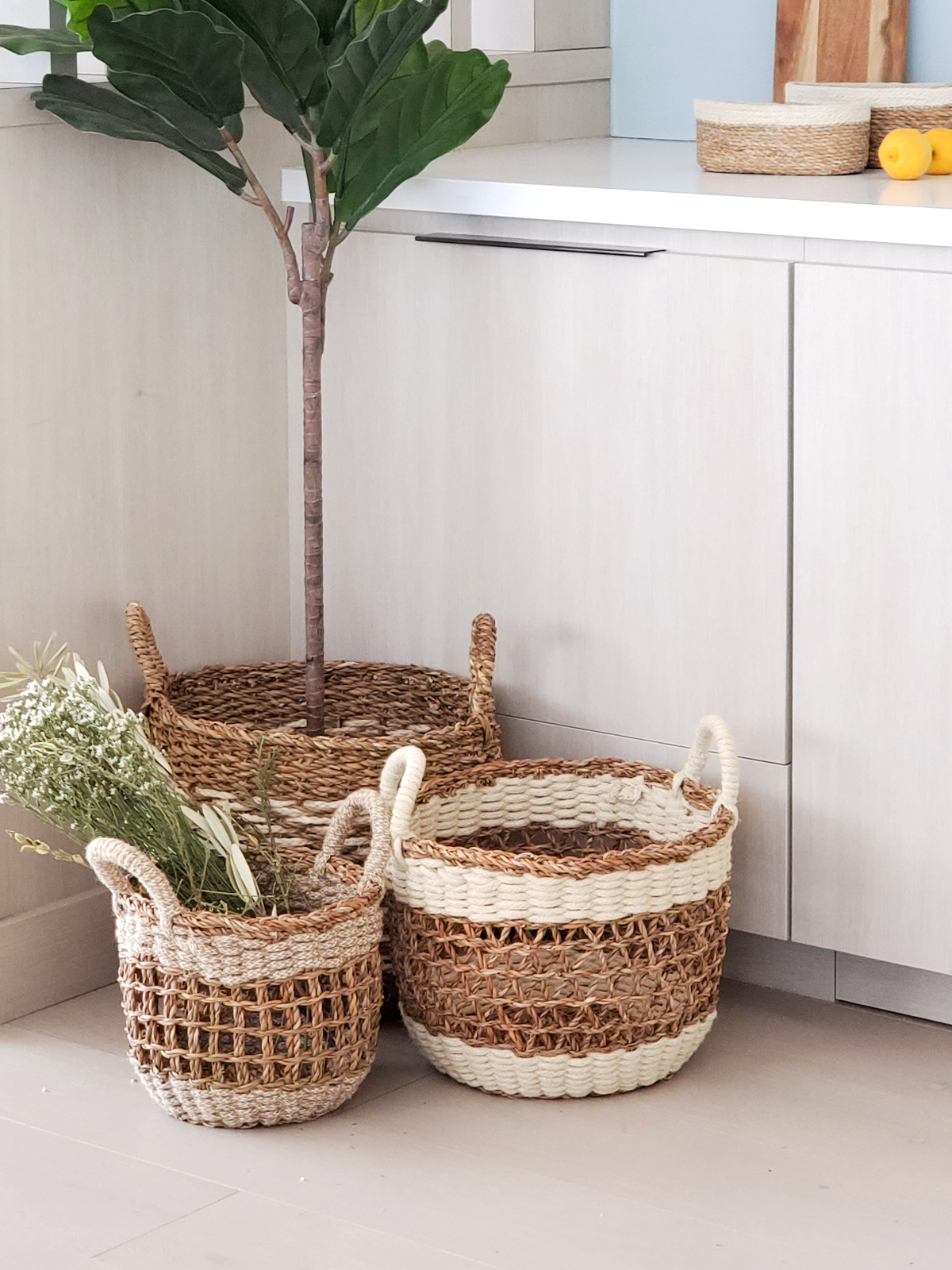 Ula Mesh Basket in natural color, handcrafted from seagrass and jute, showcasing its stylish design and multifunctional use.