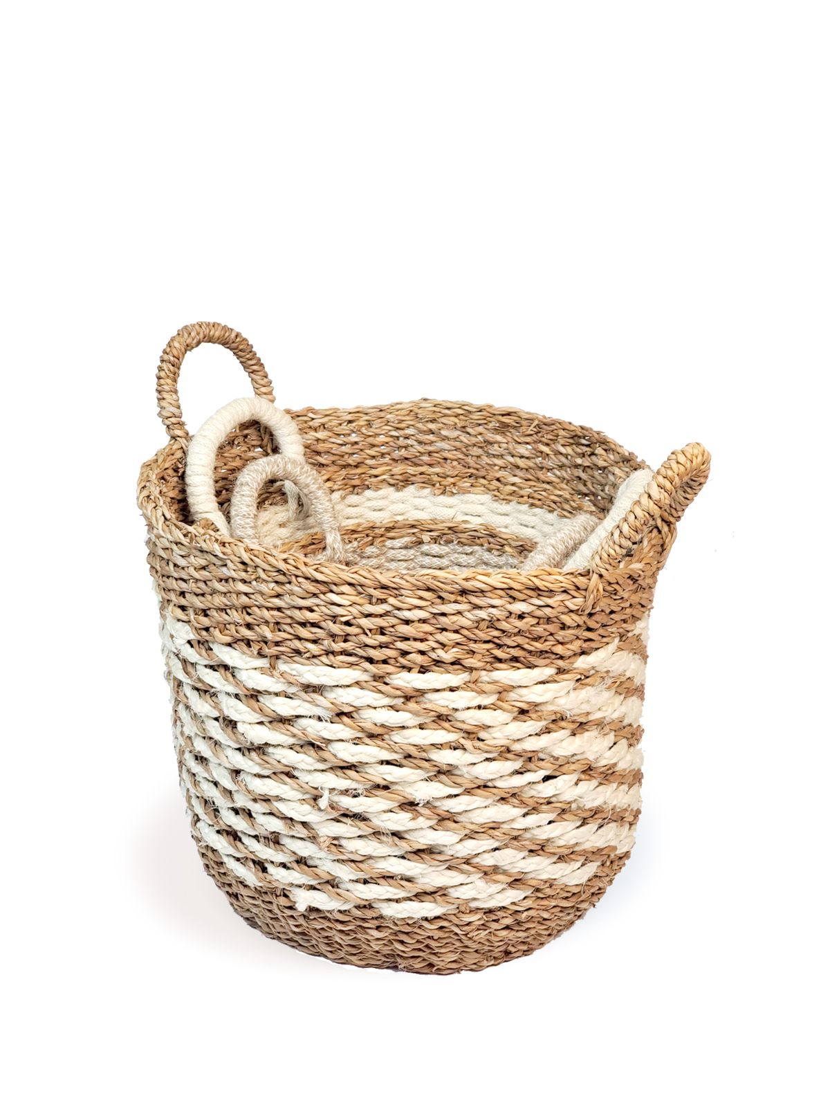 Ula Mesh Basket in natural color, handcrafted from seagrass and jute, showcasing its stylish design and multifunctional use.