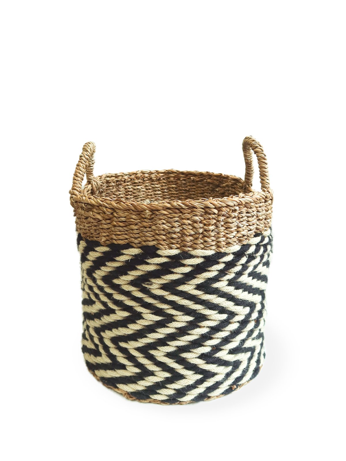 Ula Zigzag Basket handwoven from seagrass and jute, featuring a stylish zigzag pattern in natural, black, and white colors.