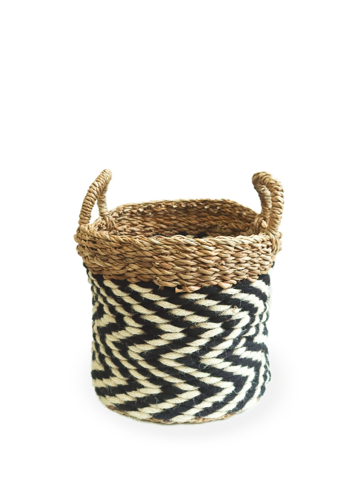 Ula Zigzag Basket handwoven from seagrass and jute, featuring a stylish zigzag pattern in natural, black, and white colors.