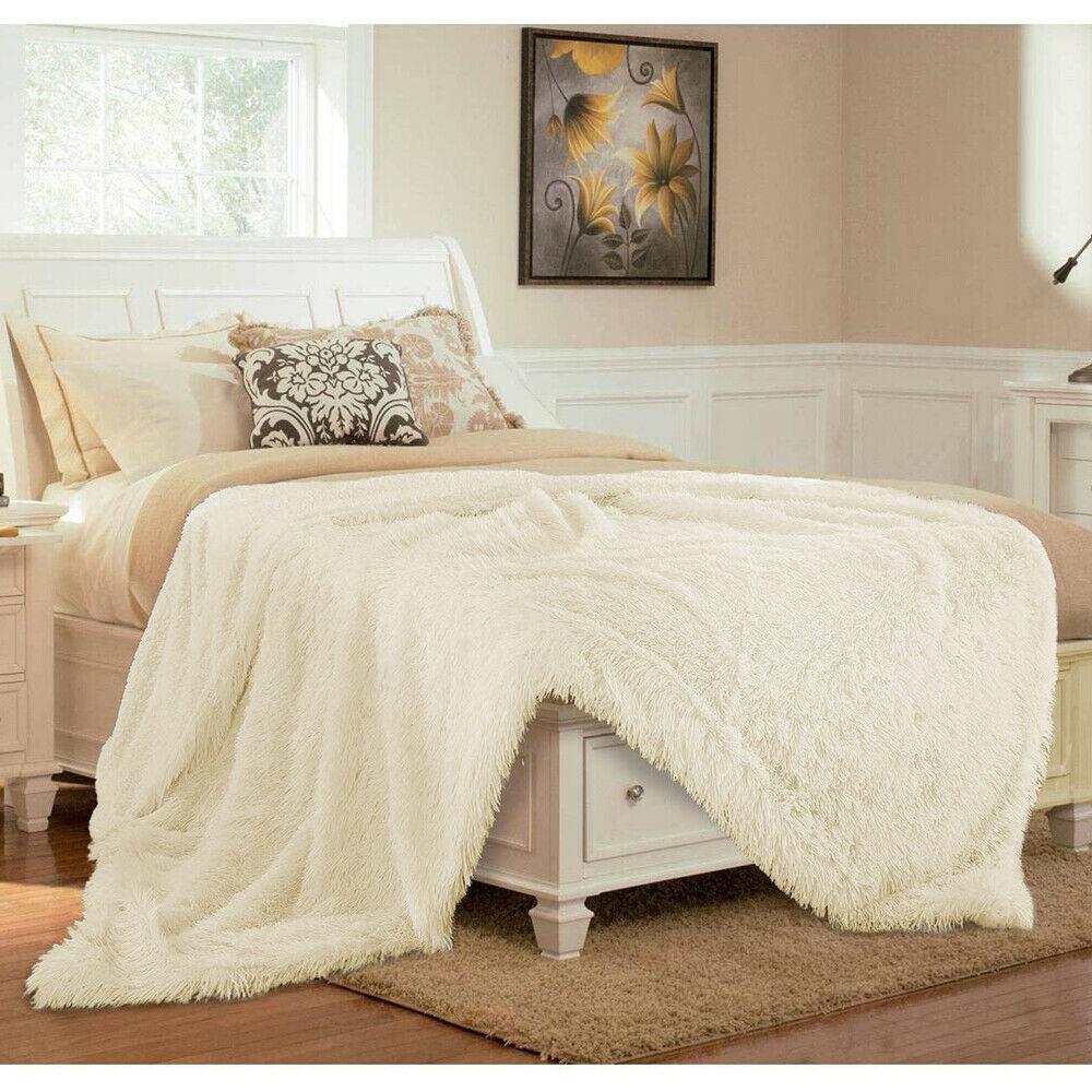 Ultra Soft Faux Fur Throw Blanket in pink, gray, white, and coffee colors, showcasing its plush texture and reversible design.