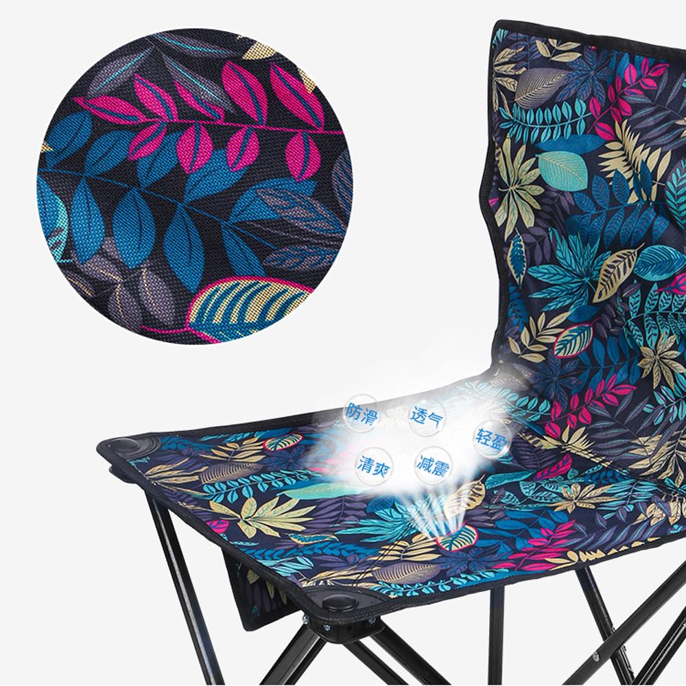 Ultralight Outdoor Chair in a vibrant setting, showcasing its portable design and cushioned seat.