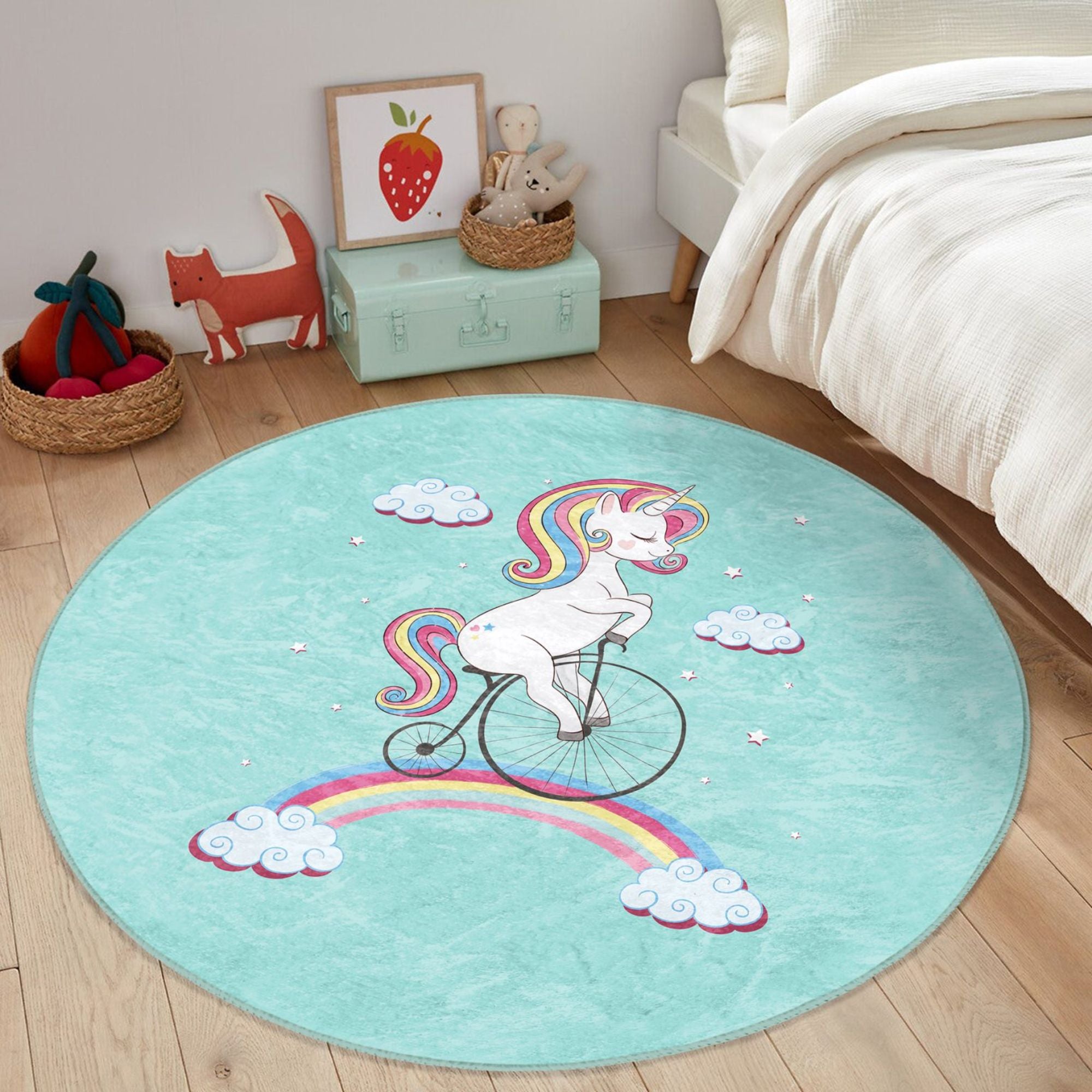 A colorful kids rug featuring a unicorn riding a bicycle on a rainbow, designed for playful and cozy environments.