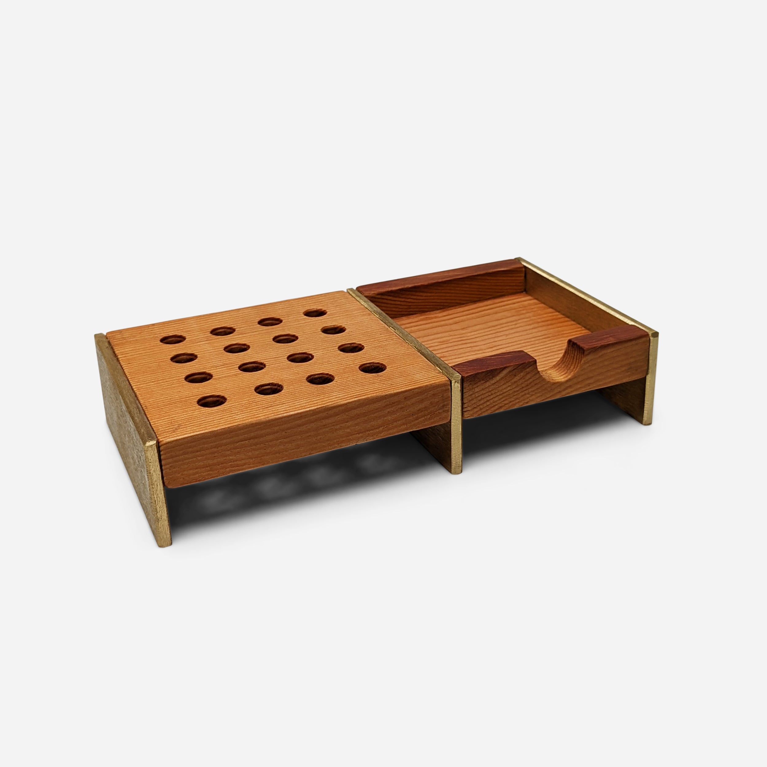 Unite desk organizer made of Doug Fir wood with brass accents, featuring compartments for pens and notes.