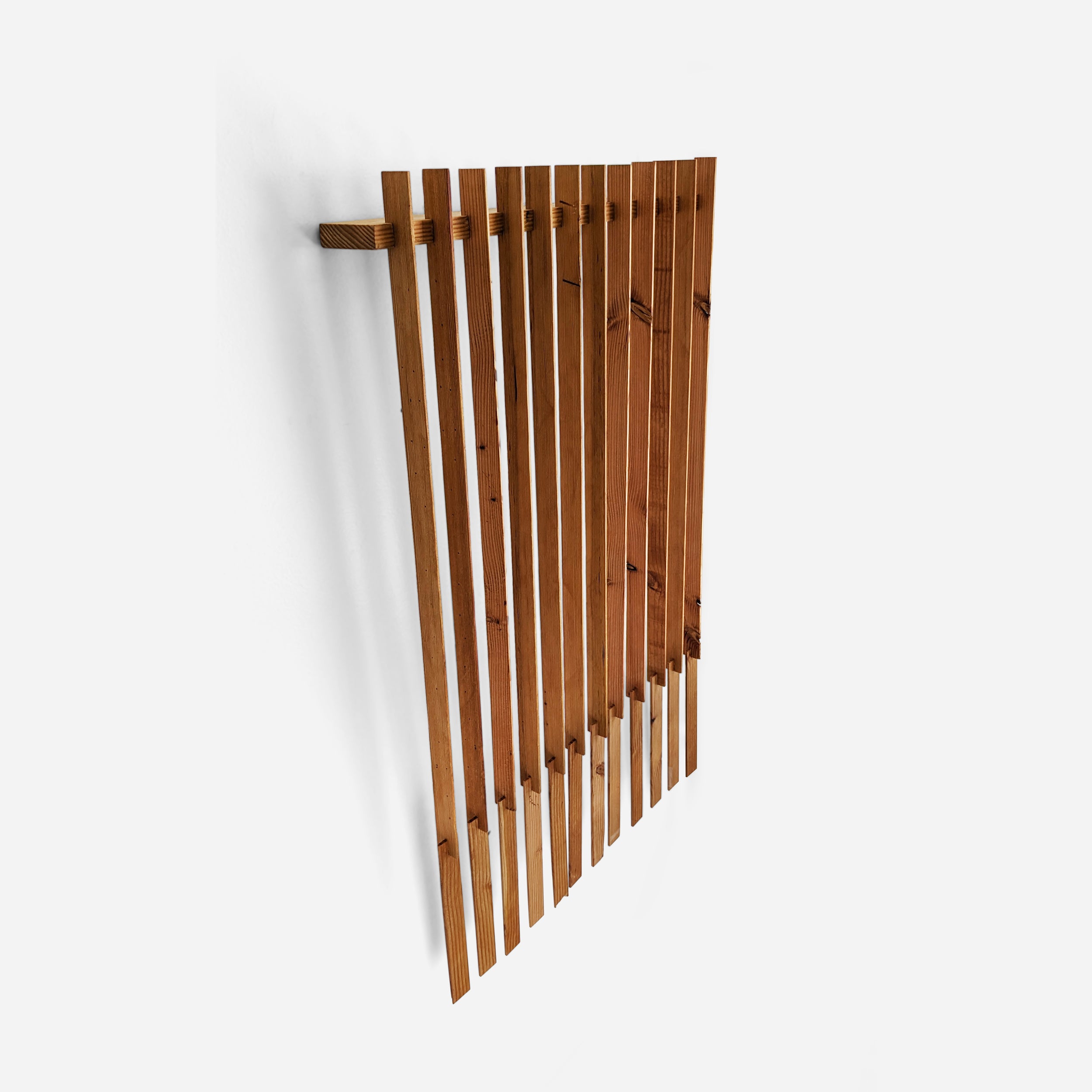 Untitled #13 wall art featuring intersecting reclaimed wood strips, showcasing a unique 3D design with a natural finish.