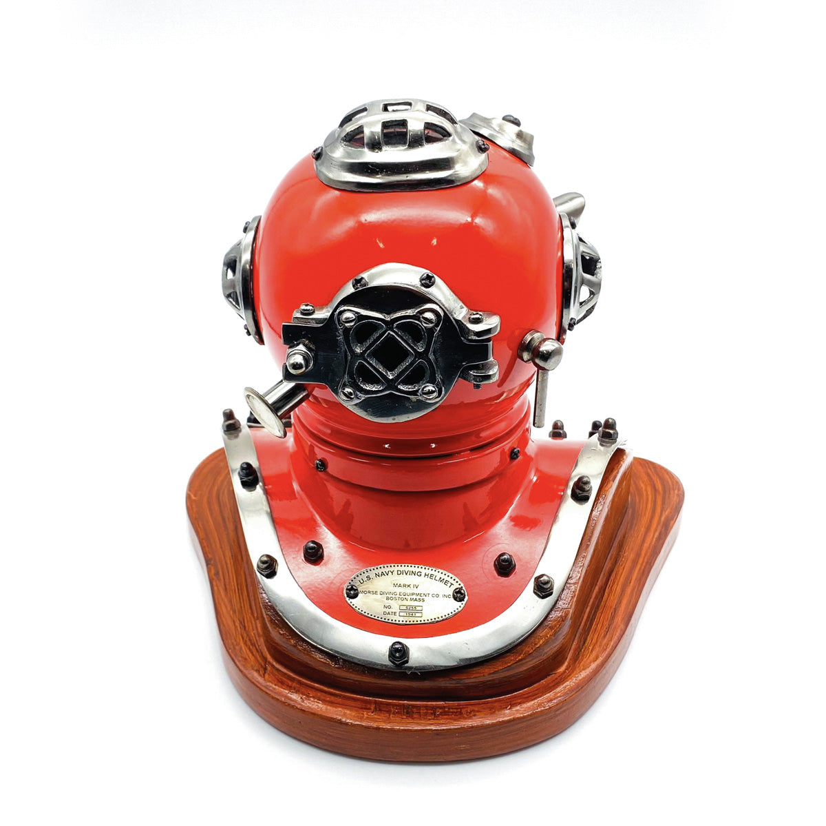 A detailed miniature model of the US Navy Mark V Diving Helmet in red with antique brass finish and magnifying glass viewing window.