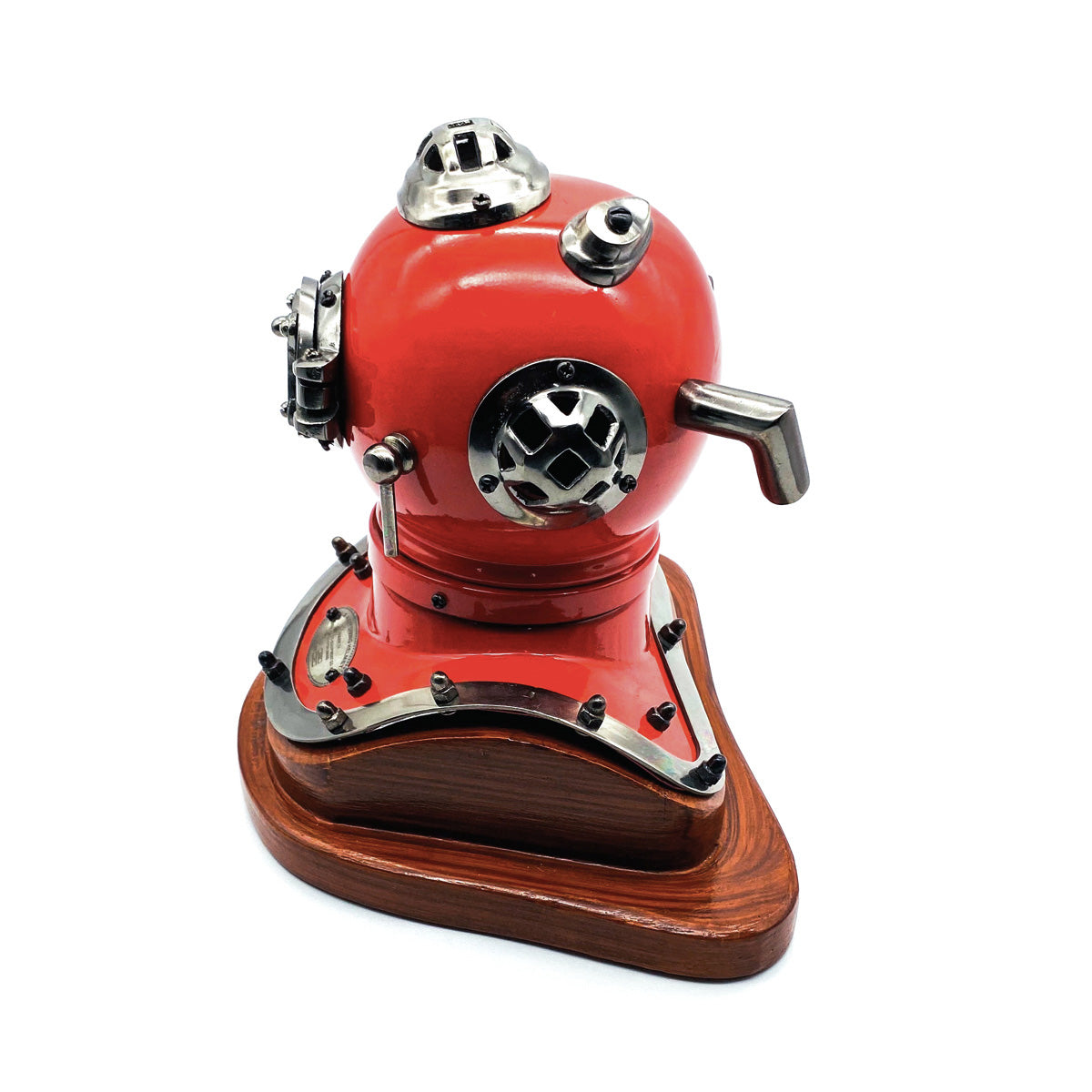 A detailed miniature model of the US Navy Mark V Diving Helmet in red with antique brass finish and magnifying glass viewing window.