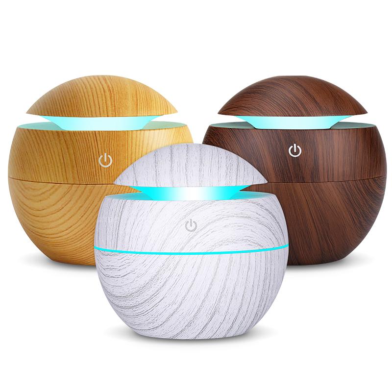 USB Aroma Diffuser Ultrasonic Cool Mist Humidifier in yellow, showcasing its sleek design and LED night light feature.