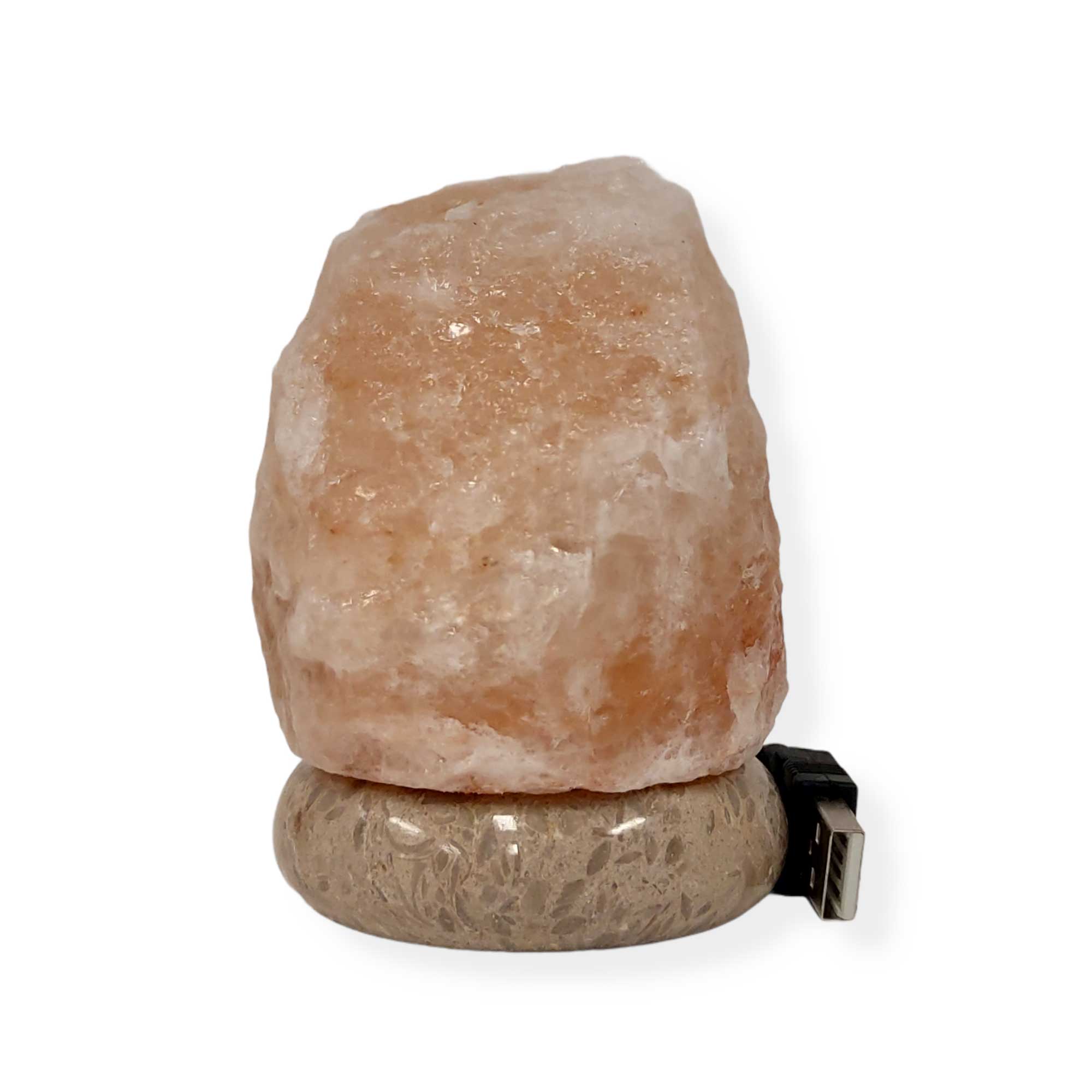 USB Himalayan Pink Rock Salt Lamp with carved shapes, glowing softly, showcasing its natural beauty and LED light.