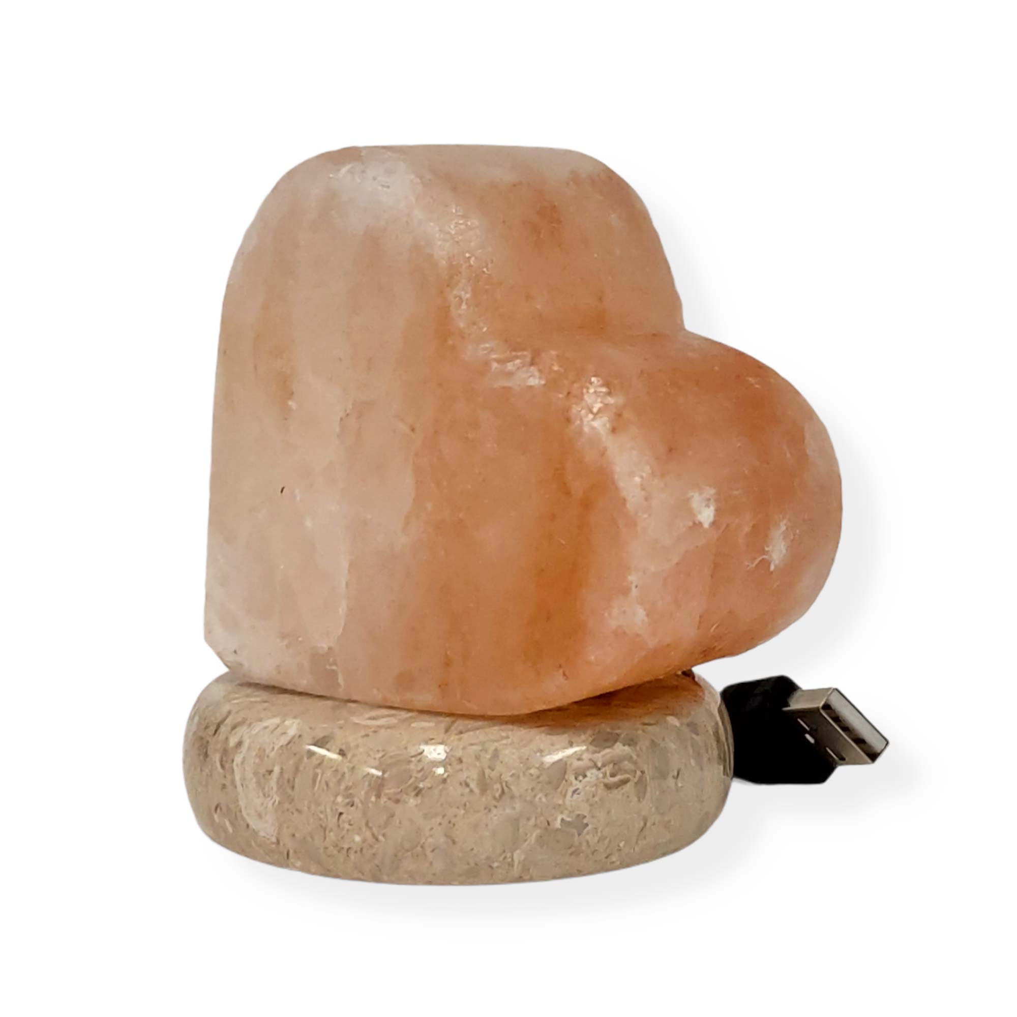 USB Himalayan Pink Rock Salt Lamp with carved shapes, glowing softly, showcasing its natural beauty and LED light.