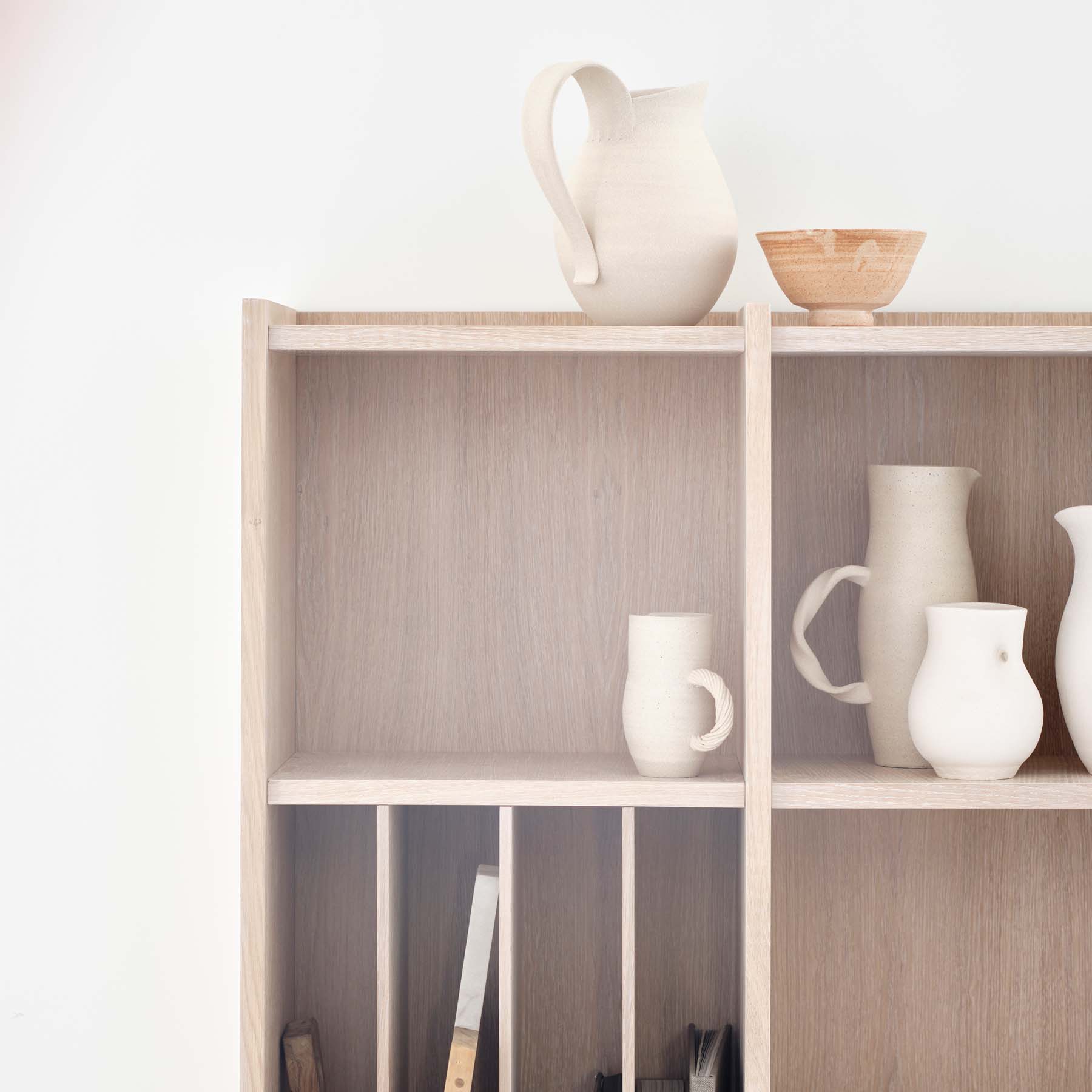 VALRYGG Shelving 1005 featuring a high-end oak veneer finish, designed for versatile storage solutions in modern interiors.