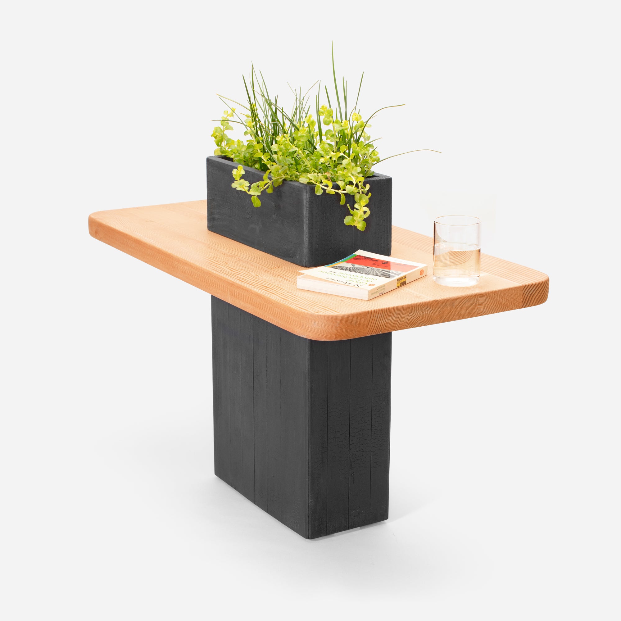 VegeTABLE side table featuring a glass vase and elegant wood design, perfect for plant lovers.